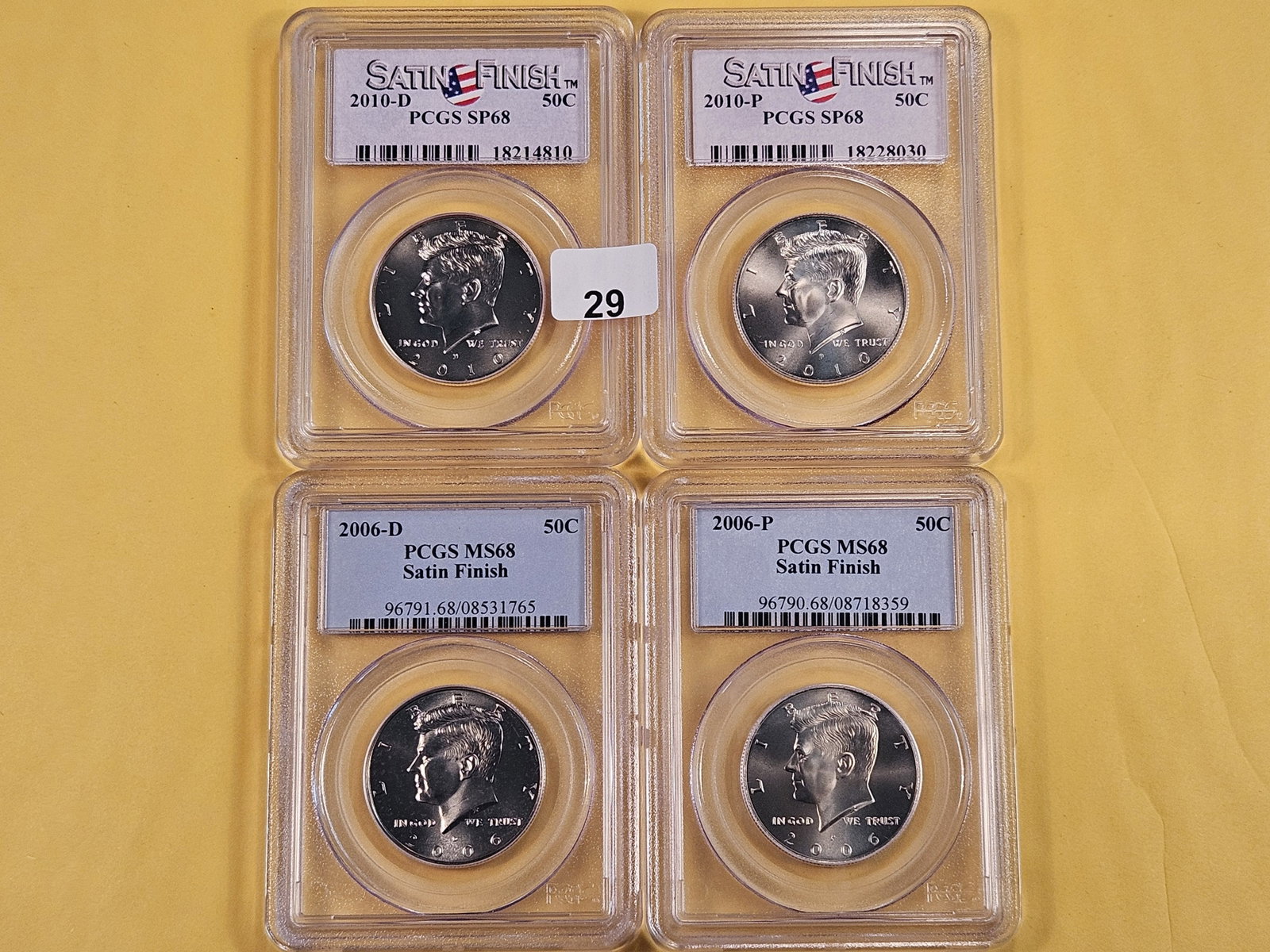 Four PCGS Kennedy Half Dollars in Specimen and Mint State 68 Satin Finish: 2006, 2010, 2006-D and 2010-D