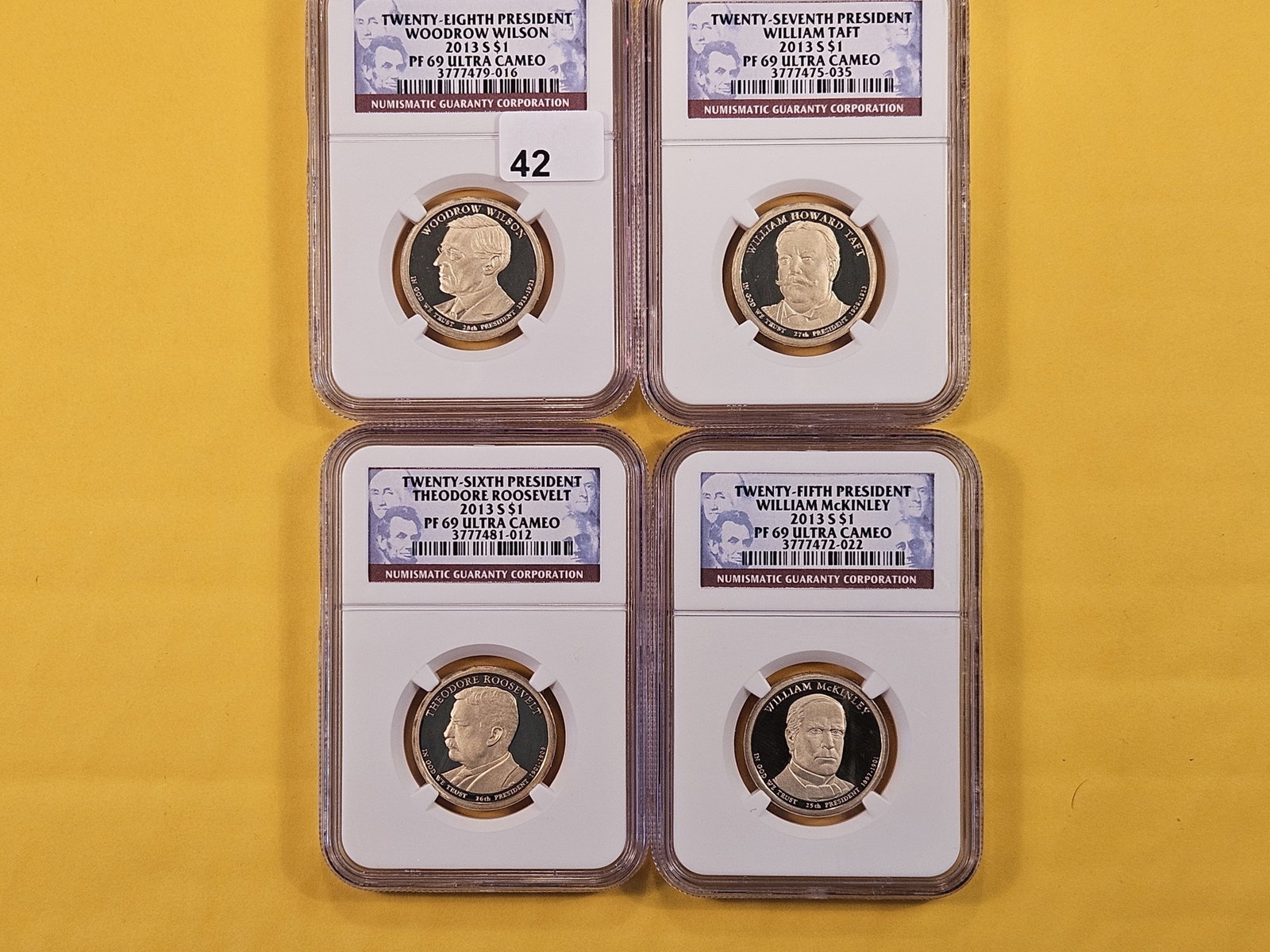 Four NGC 2013-S Presidential Dollars in Proof 69 Ultra Cameo: Woodrow Wilson, William Taft, Theodore Roosevelt and William Mckinley