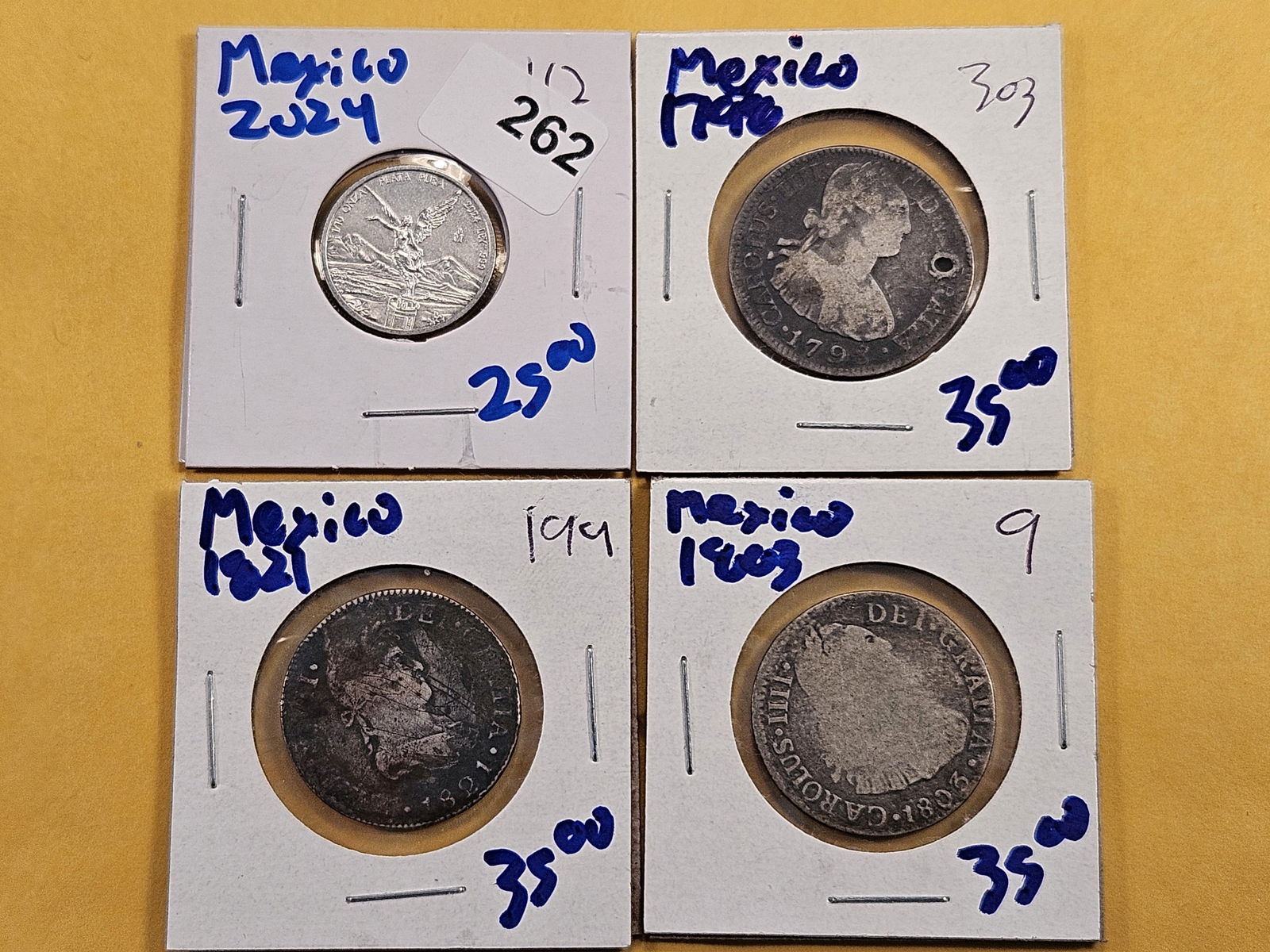 Four Foreign Silver Coins (1 of 4)