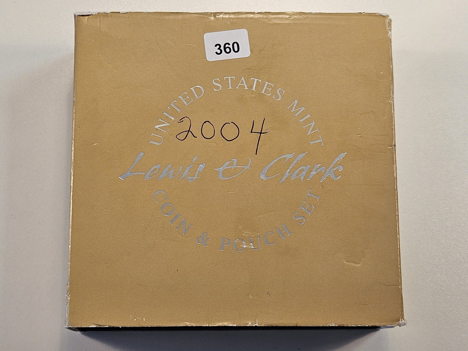 United States Mint Lewis and Clark Coin and Pouch set: Gem Proof Silver Dollar and hand made pouch. With COAs