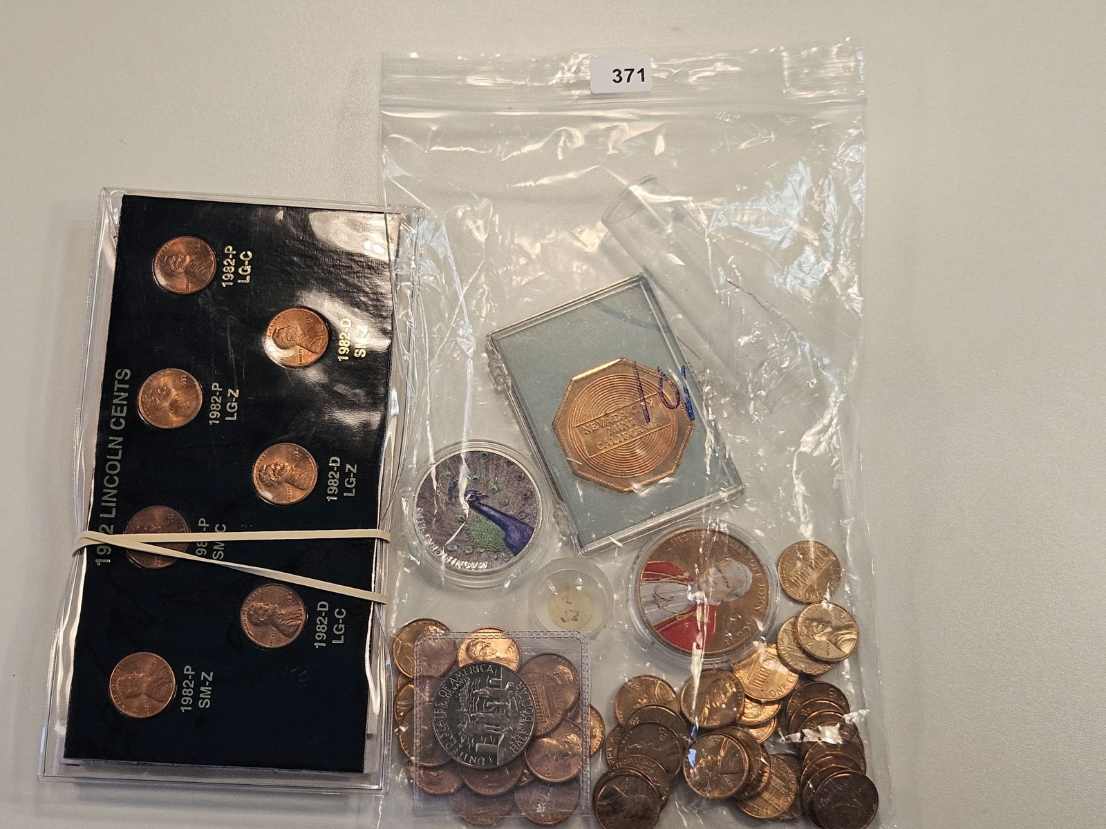 Bag of Numismatic Fun Including Seven 1982 7-Coin Lincoln Cent sets (1 of 5)