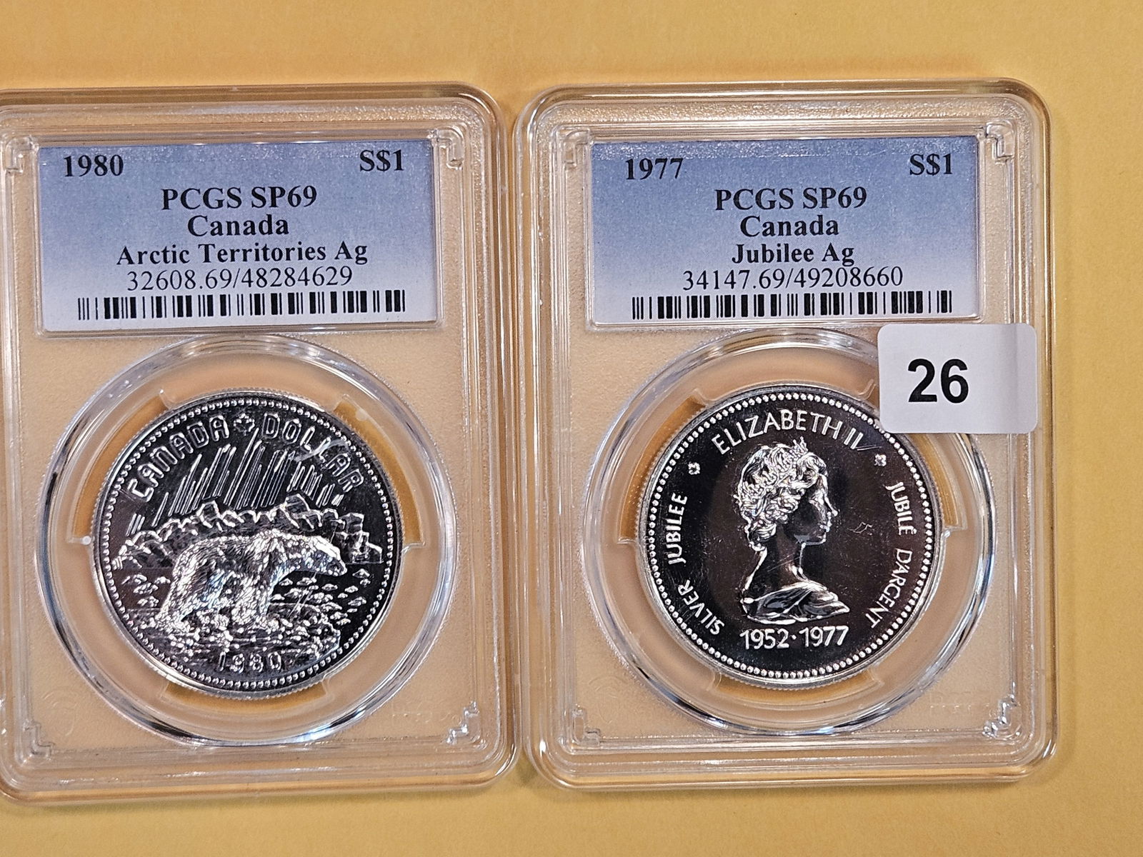 Two PCGS Specimen 69 Canada Silver Dollars (1 of 2)