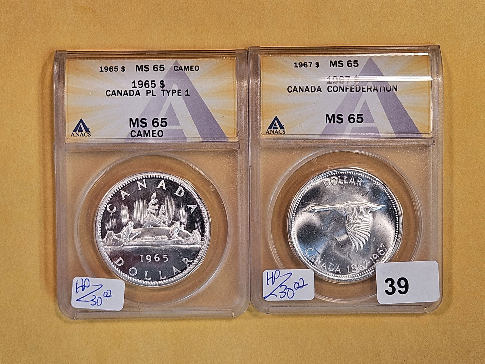 ANACS 1965 and 1967 Canada Silver Dollars (1 of 2)
