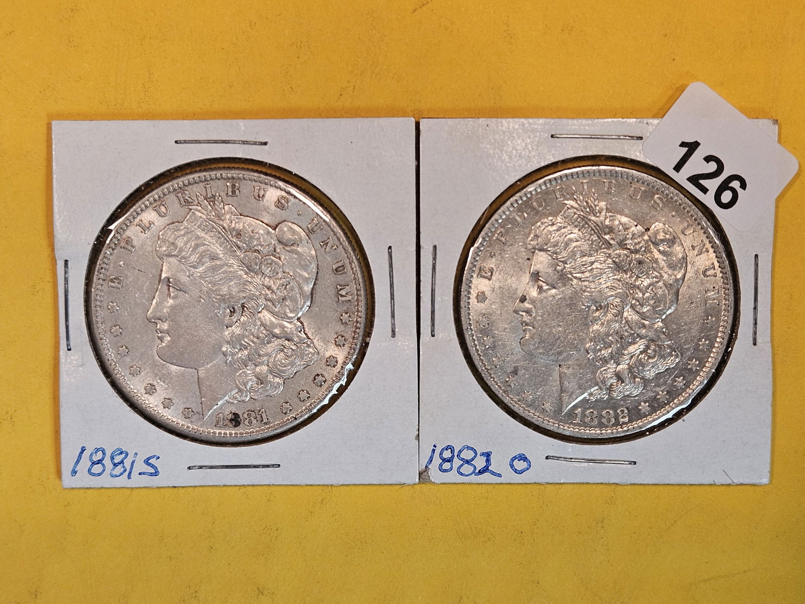 Two About Uncirculated Morgan Silver Dollars (1 of 2)