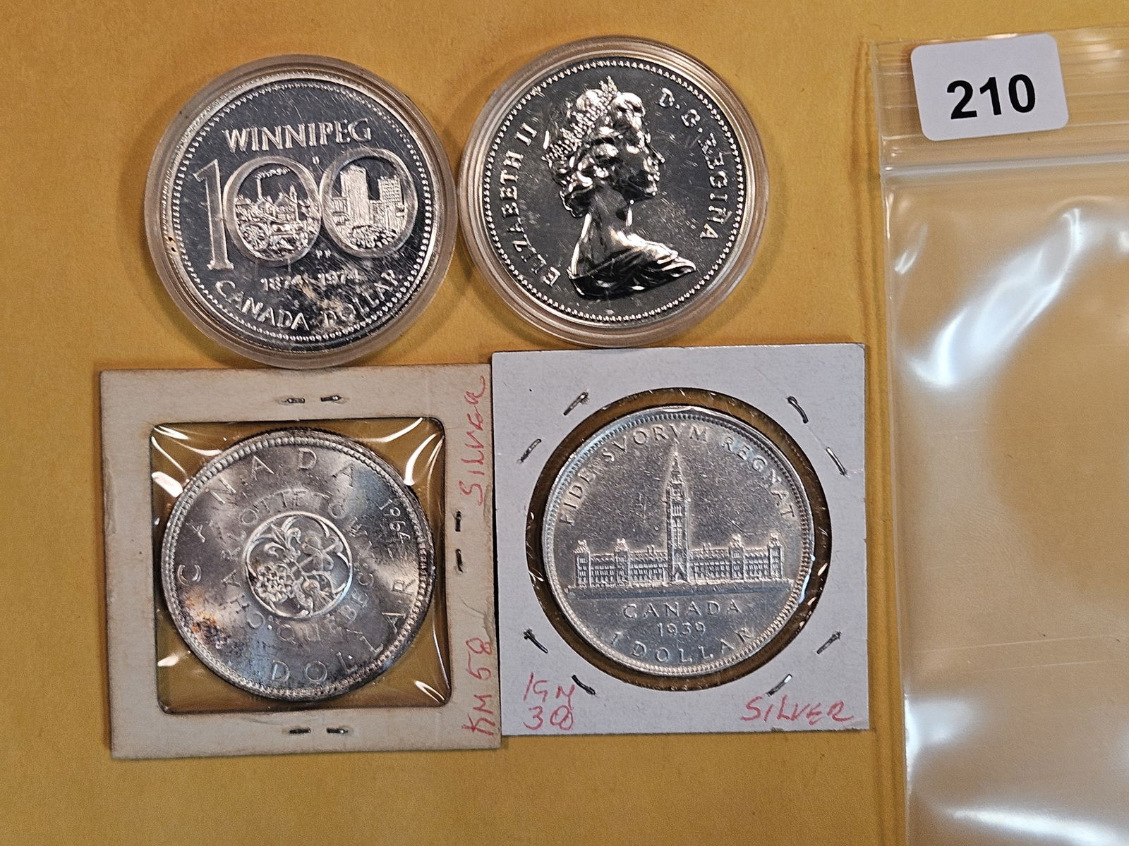 Four mixed Canada Silver Dollars (1 of 4)