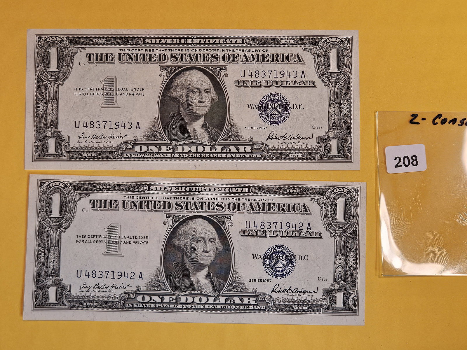 Two Consecutive Crisp Uncirculated 1957 One Dollar Silver Certificates (1 of 1)