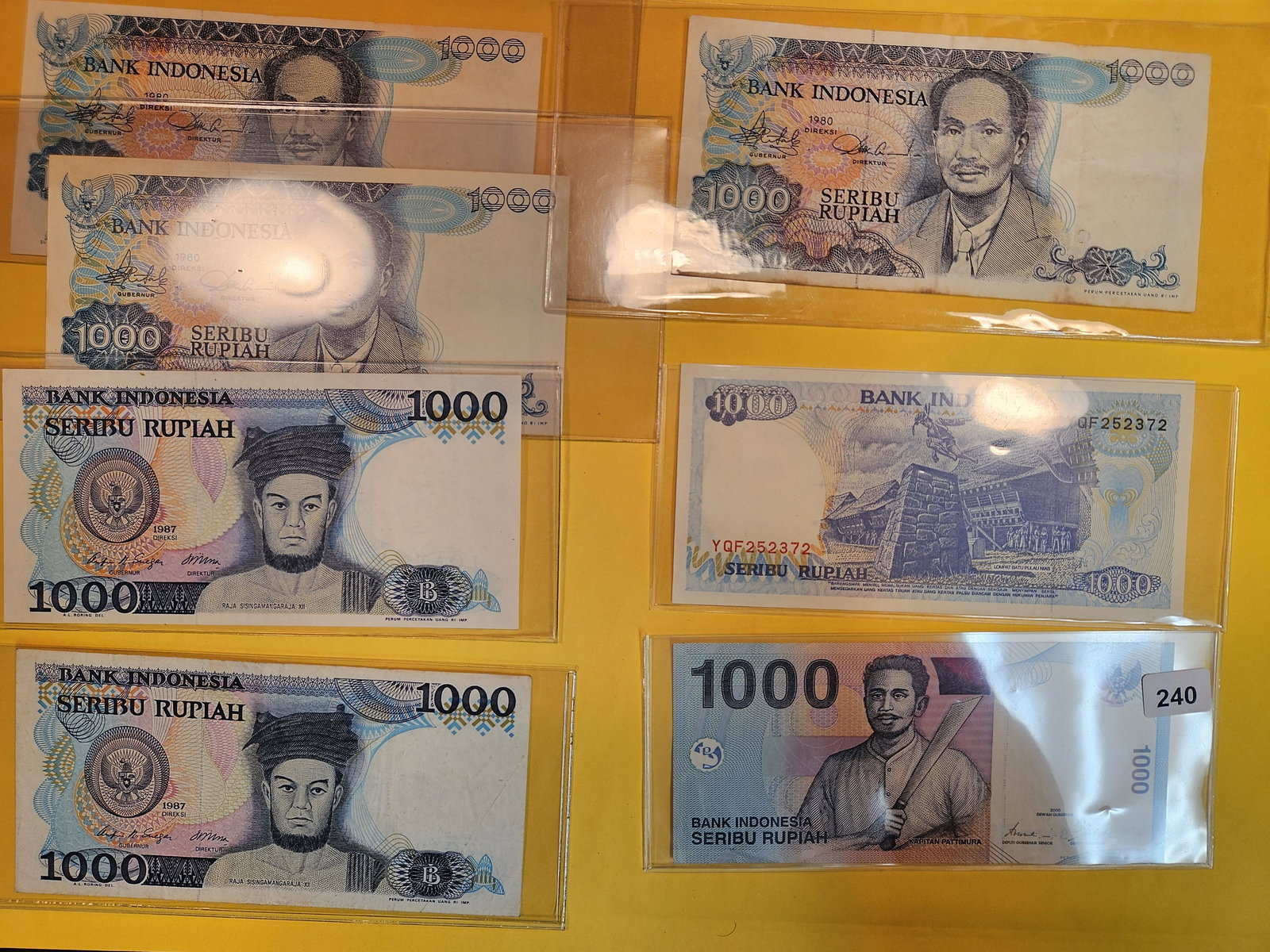 Seven mixed Bank of Indonesia 1000 Seribu Rupiah notes (1 of 4)