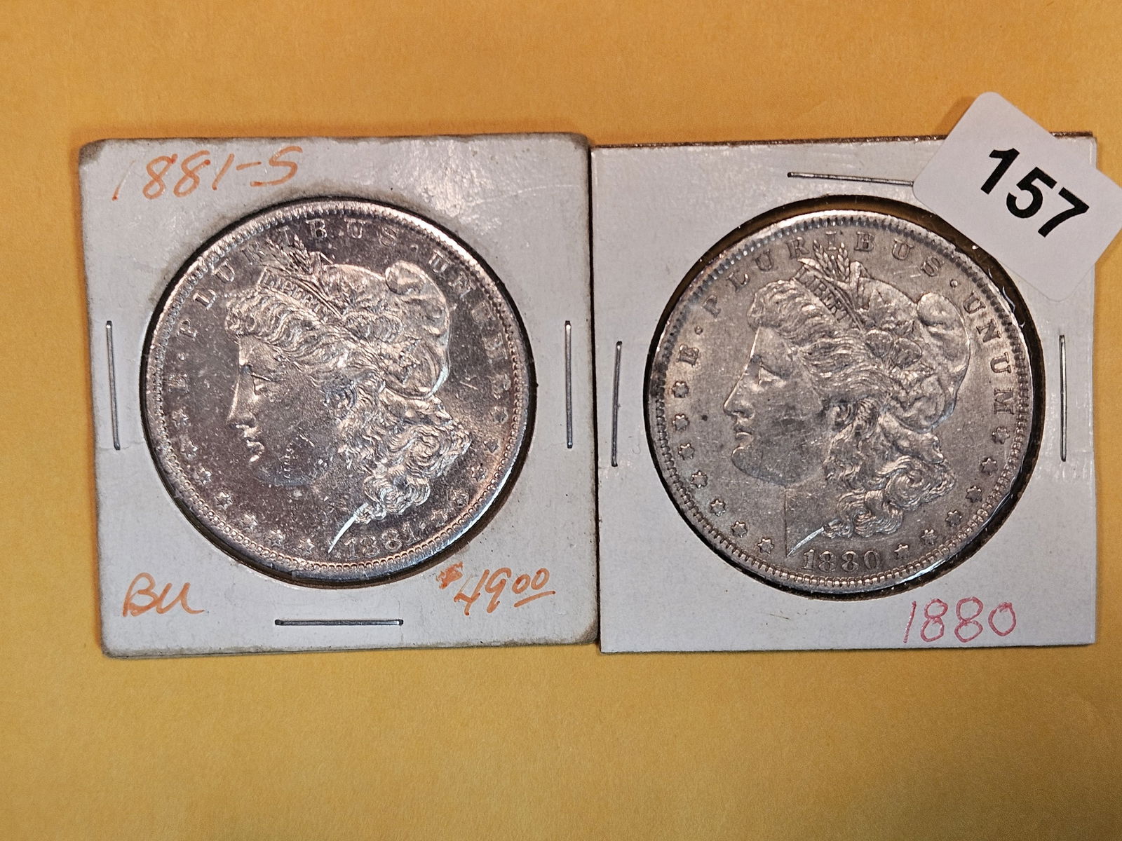 Two About Uncirculated Morgan Silver Dollars (1 of 3)