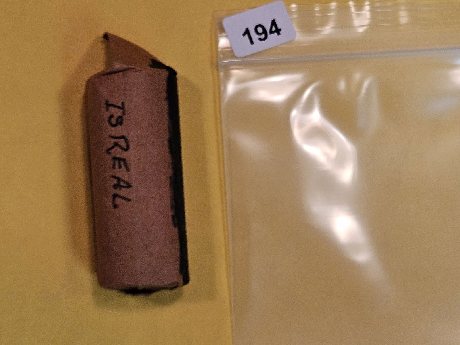 Full roll of Israel "50" coins (1 of 2)