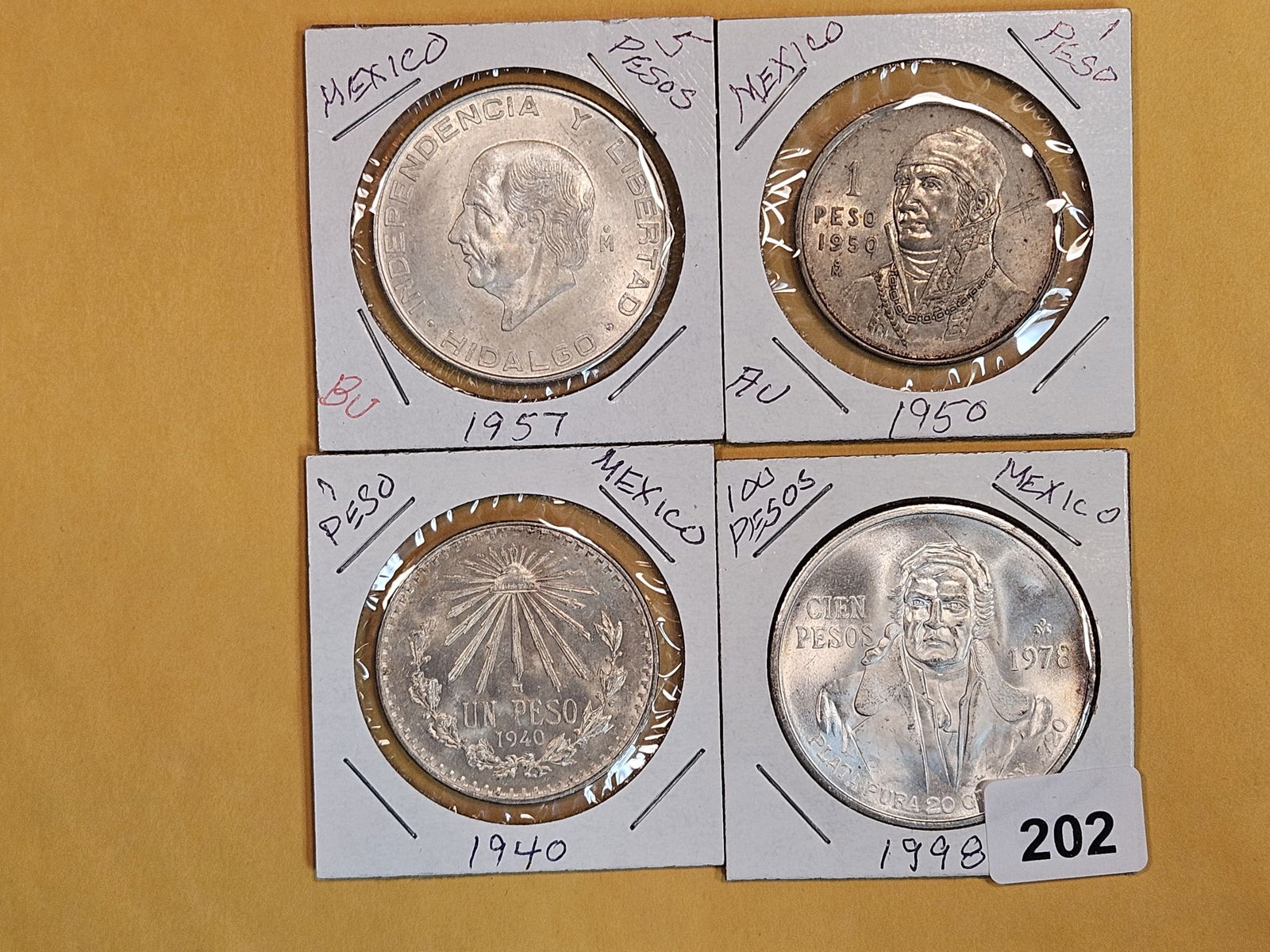 Four nice Silver mixed Mexican coins (1 of 2)