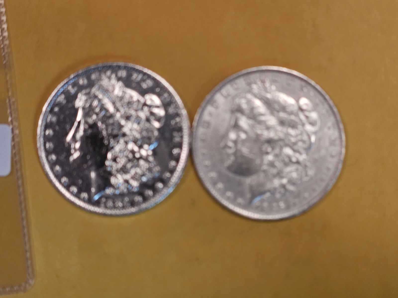 Two Morgan silver dollars in Brilliant About uncirculated plus - details (1 of 3)