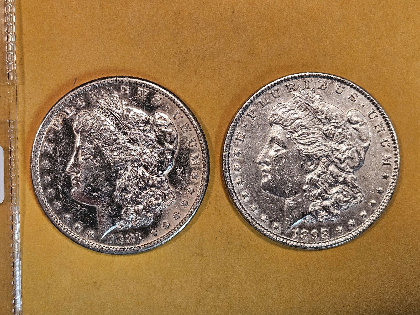 Two Morgan silver dollars in Brilliant About uncirculated plus - details (1 of 3)