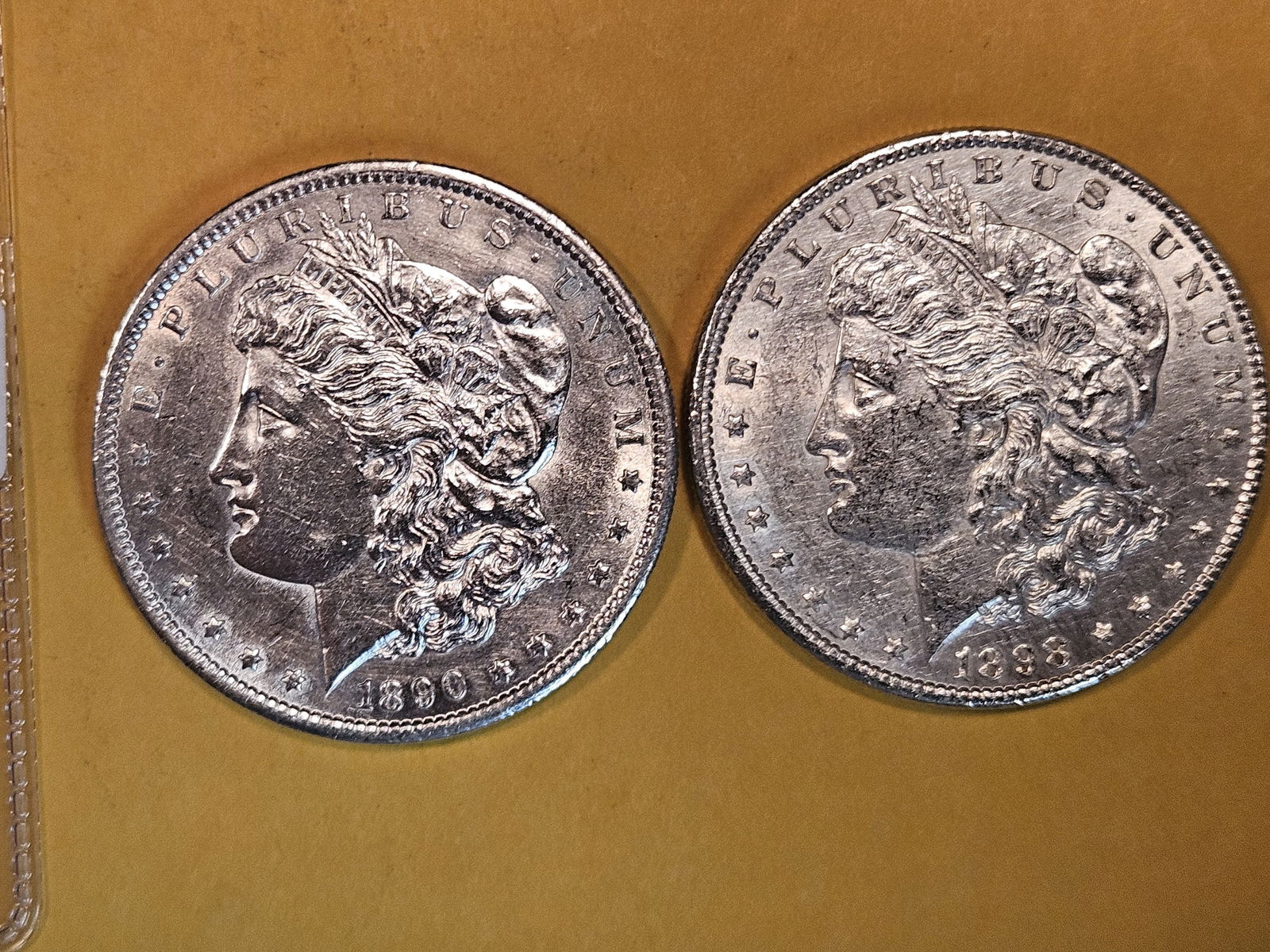 Two Morgan silver dollars in Brilliant About uncirculated plus - details (1 of 3)
