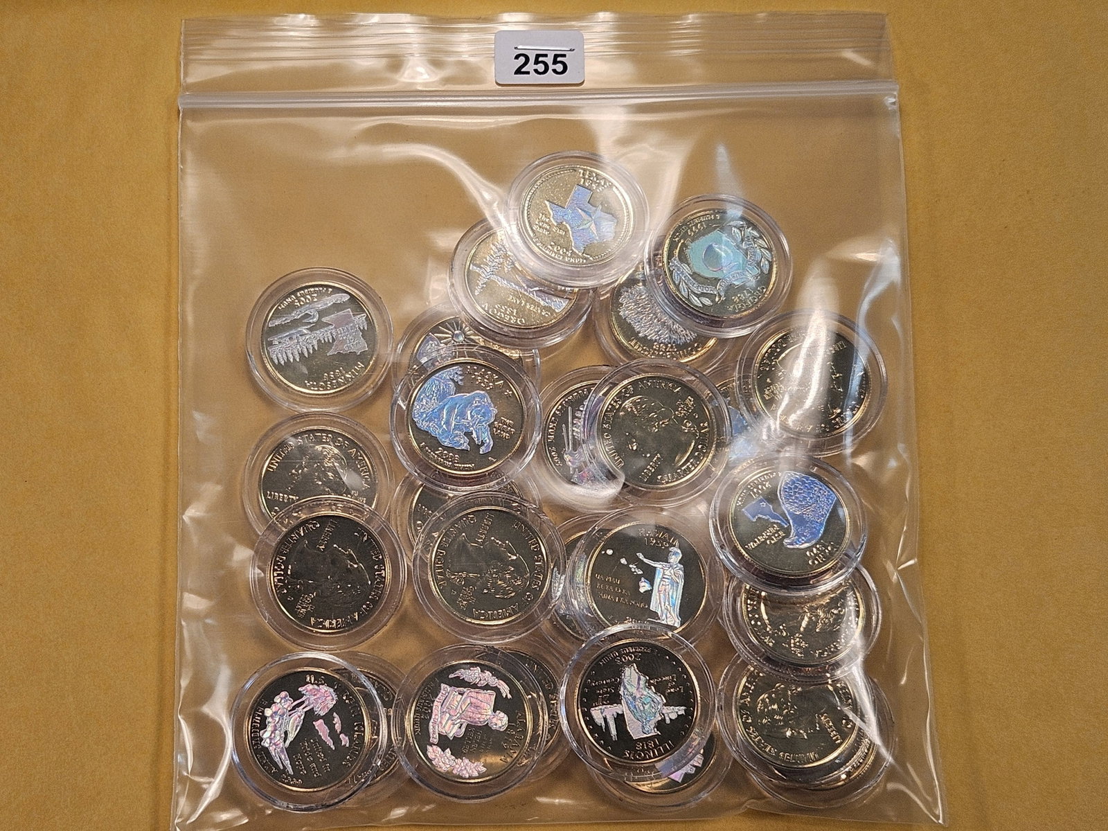Twenty-five Gold Plated Colorized Statehood Quarters: Each in individual plastic holders