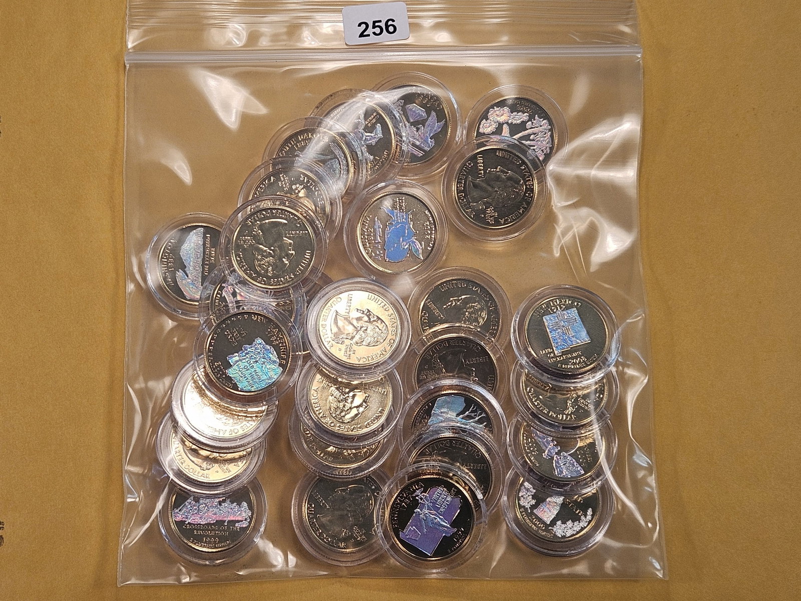 Twenty-five Gold Plated Colorized Statehood Quarters: Each in individual plastic holders
