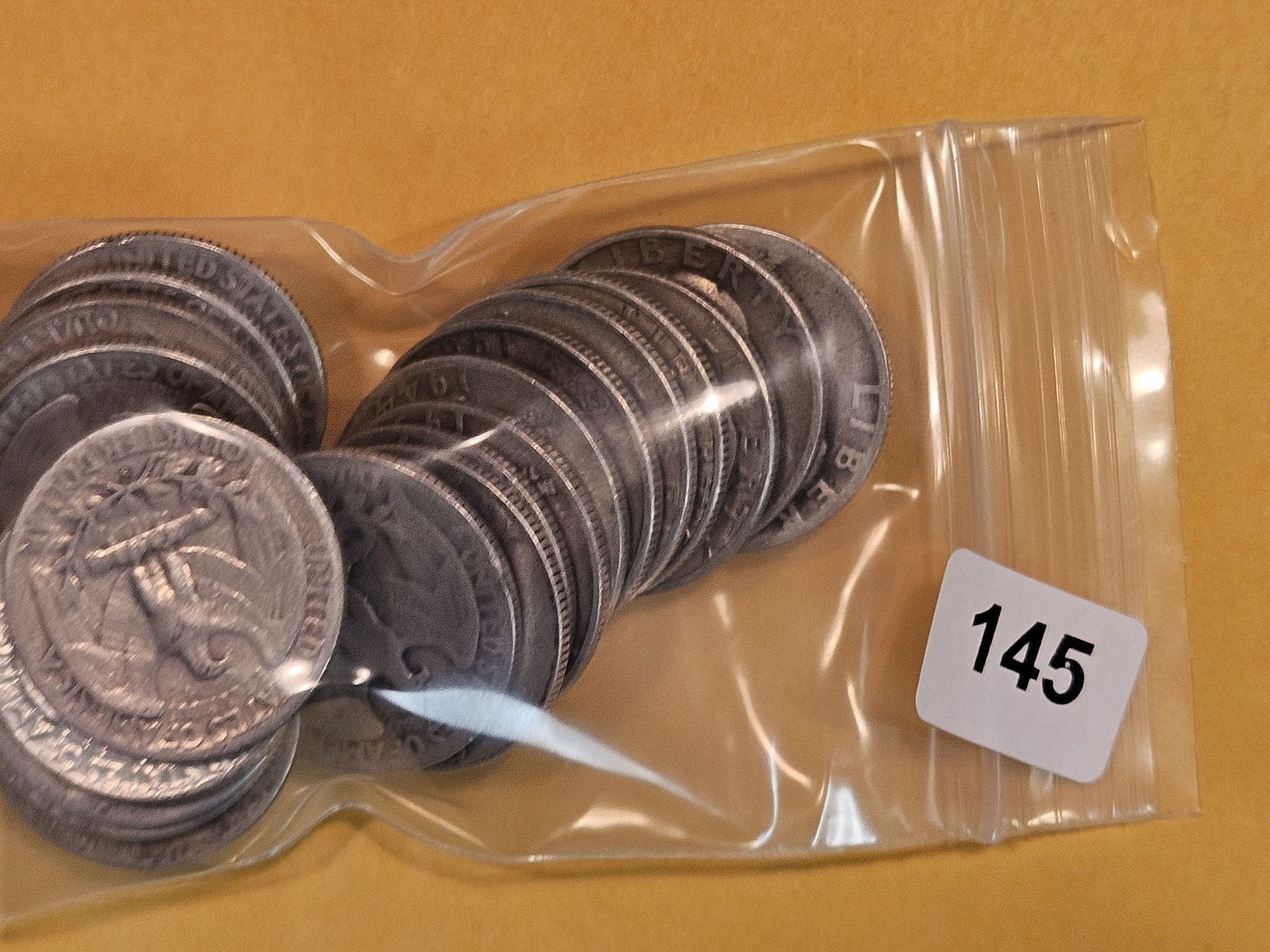 Twenty mixed silver Washington Quarters (1 of 2)