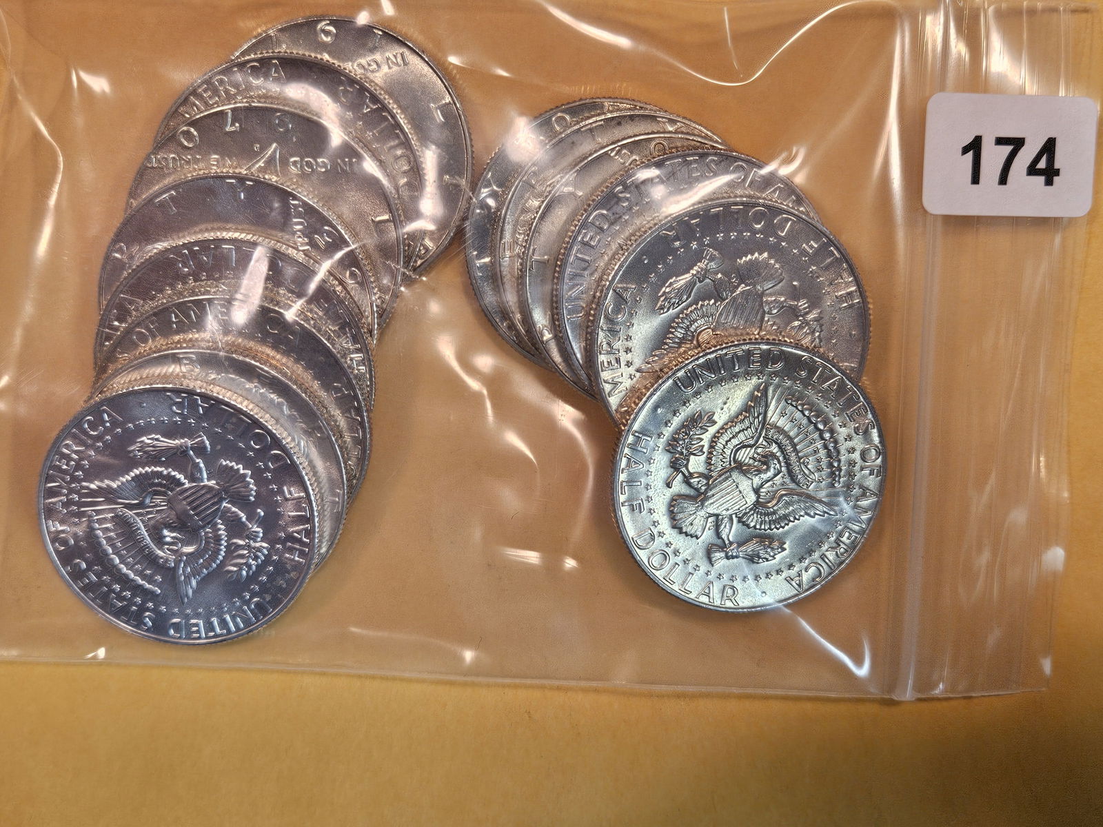 Fourteen mixed GEM Brilliant Uncirculated Silver Kennedy Half Dollars (1 of 3)