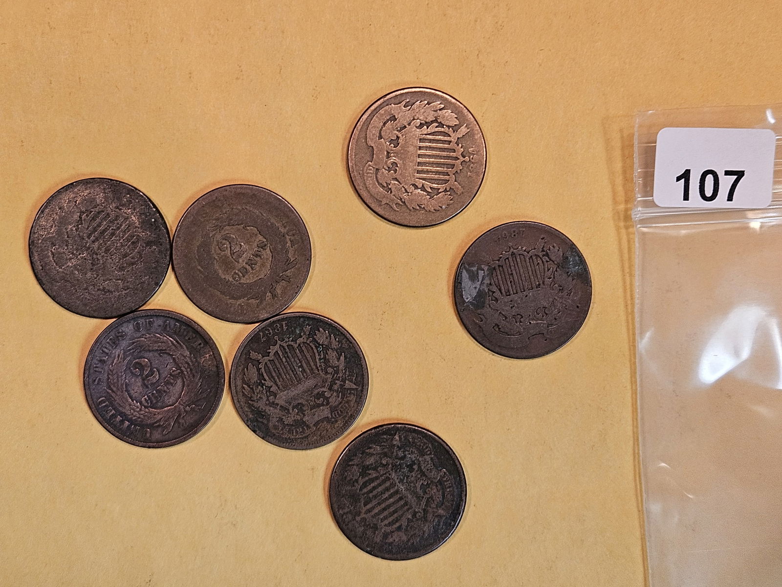 Seven mixed 2-Cent pieces (1 of 2)