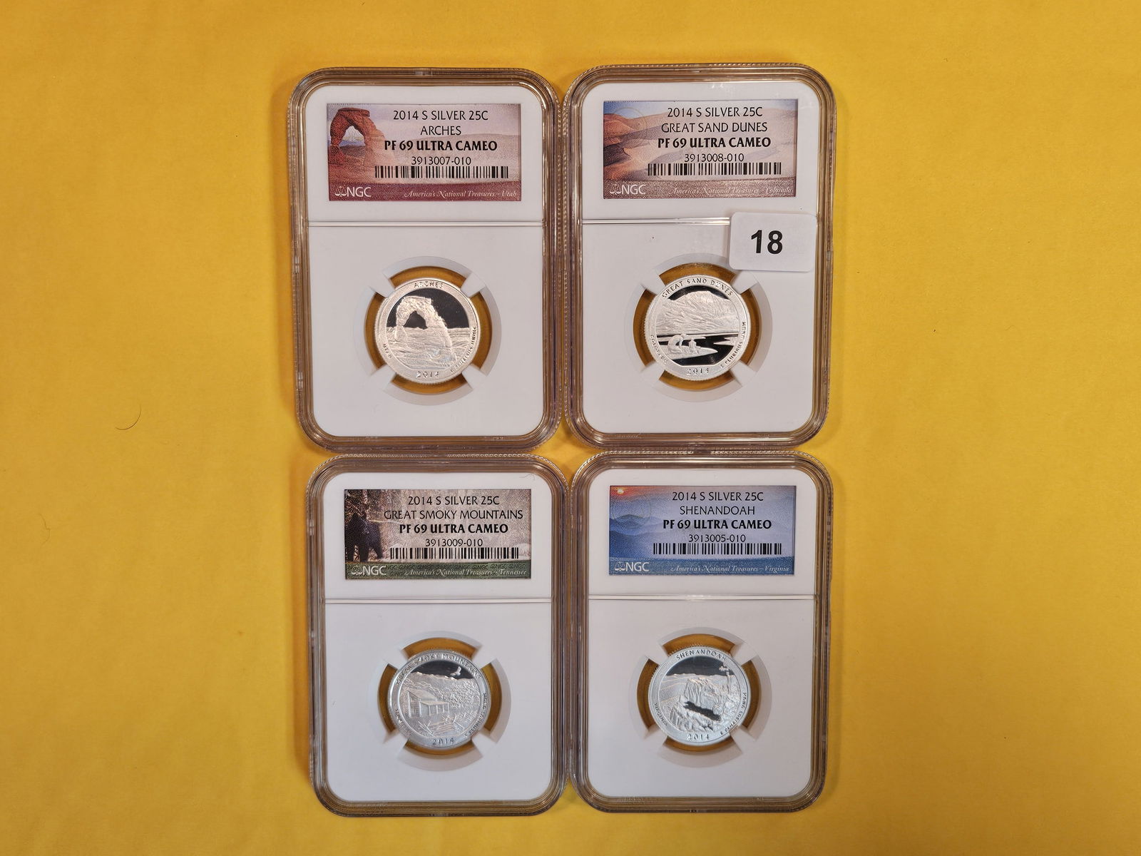 Four NGC-graded Silver Washington Quarters in Proof 69 Ultra Cameo (1 of 2)