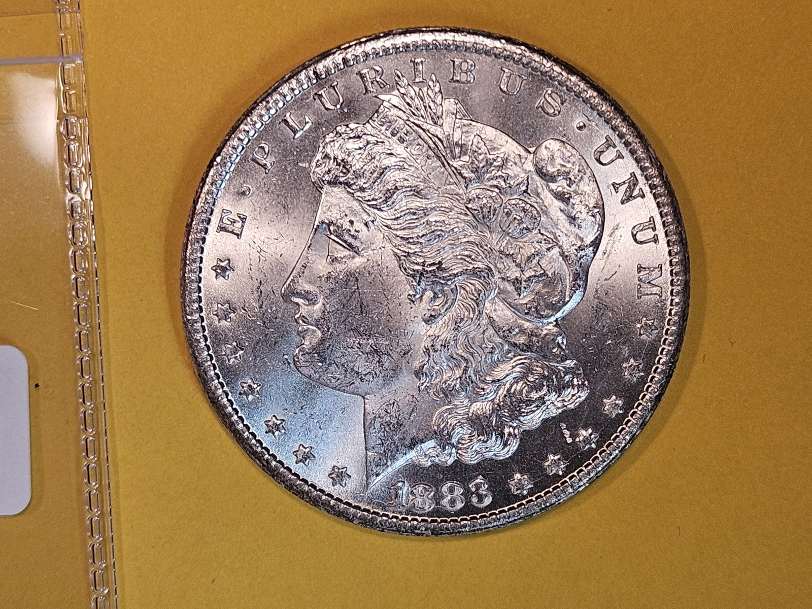 ** KEY DATE ** Choice Brilliant Uncirculated 1883-CC Morgan Dollar: KEY DATE! CARSON CITY! Good contrast. Sharp and well-struck