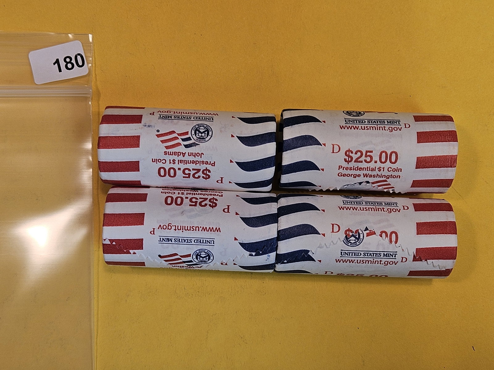 Four Mint-Wrapped Brilliant Uncirculated Presidential Dollar Rolls: Two P and Two D