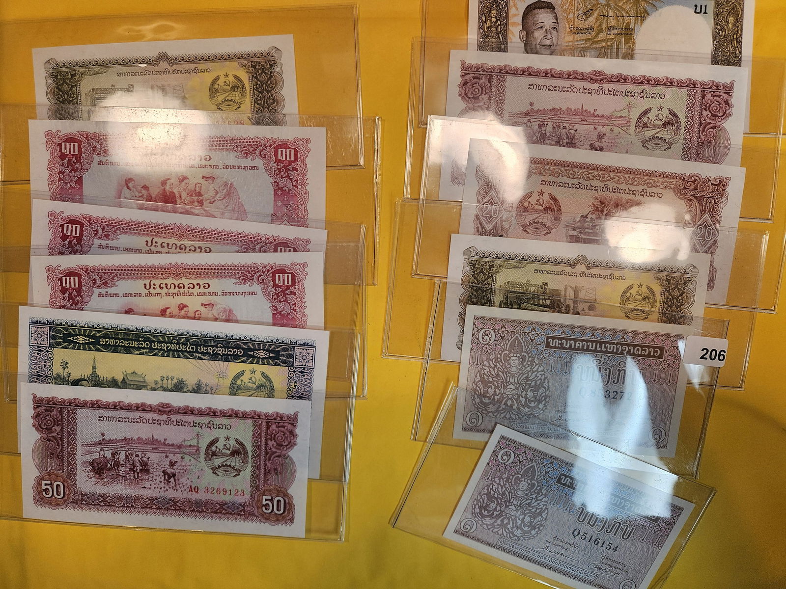 Fifteen mixed, Crisp Uncirculated, notes from Laos (1 of 3)