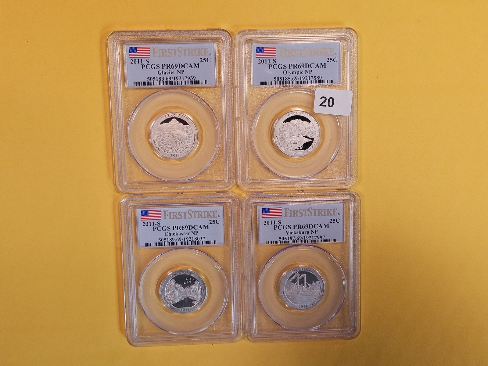 Four PCGS-graded Proof 69 Deep Cameo Washington Quarters (1 of 2)