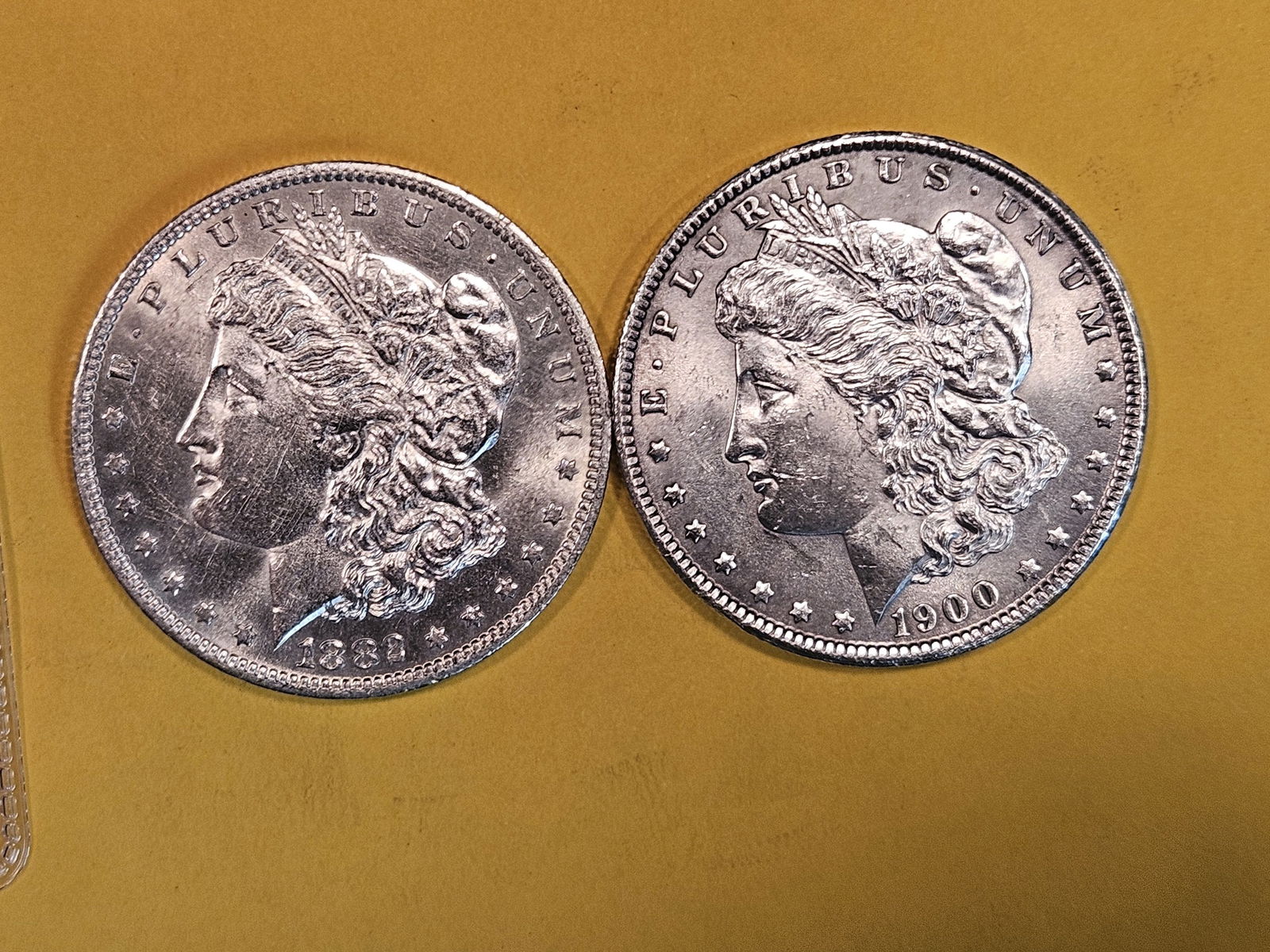 Two Brilliant About Uncirculated plus Morgan Silver Dollars (1 of 3)