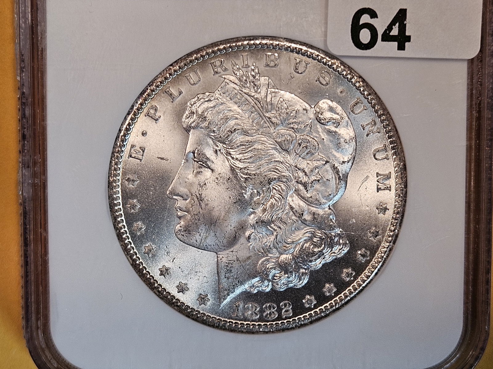 ** KEY DATE ** NGC 1882-CC Morgan Dollar in Mint State 64 (1 of 5)