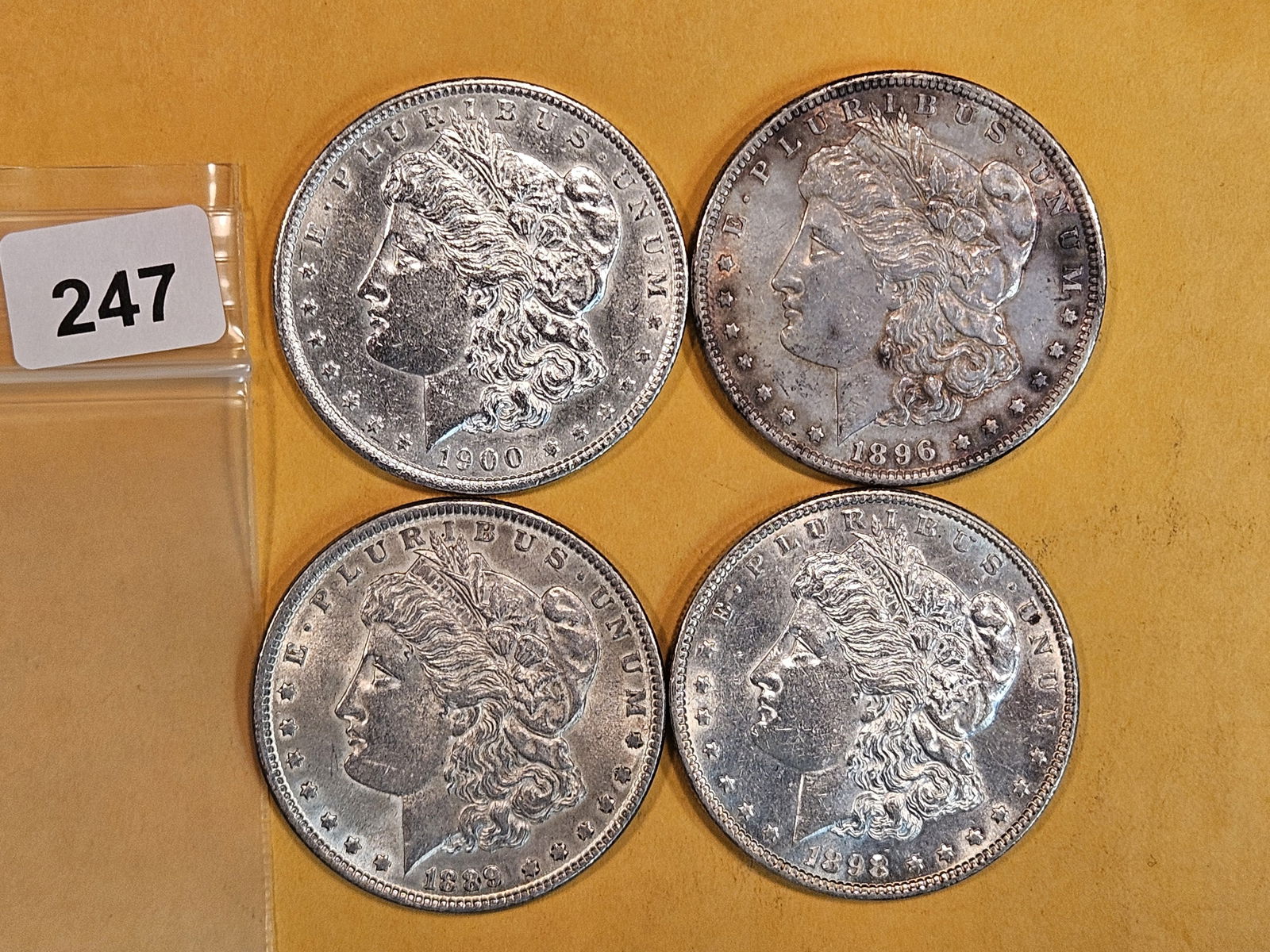Four Morgan silver Dollars (1 of 3)