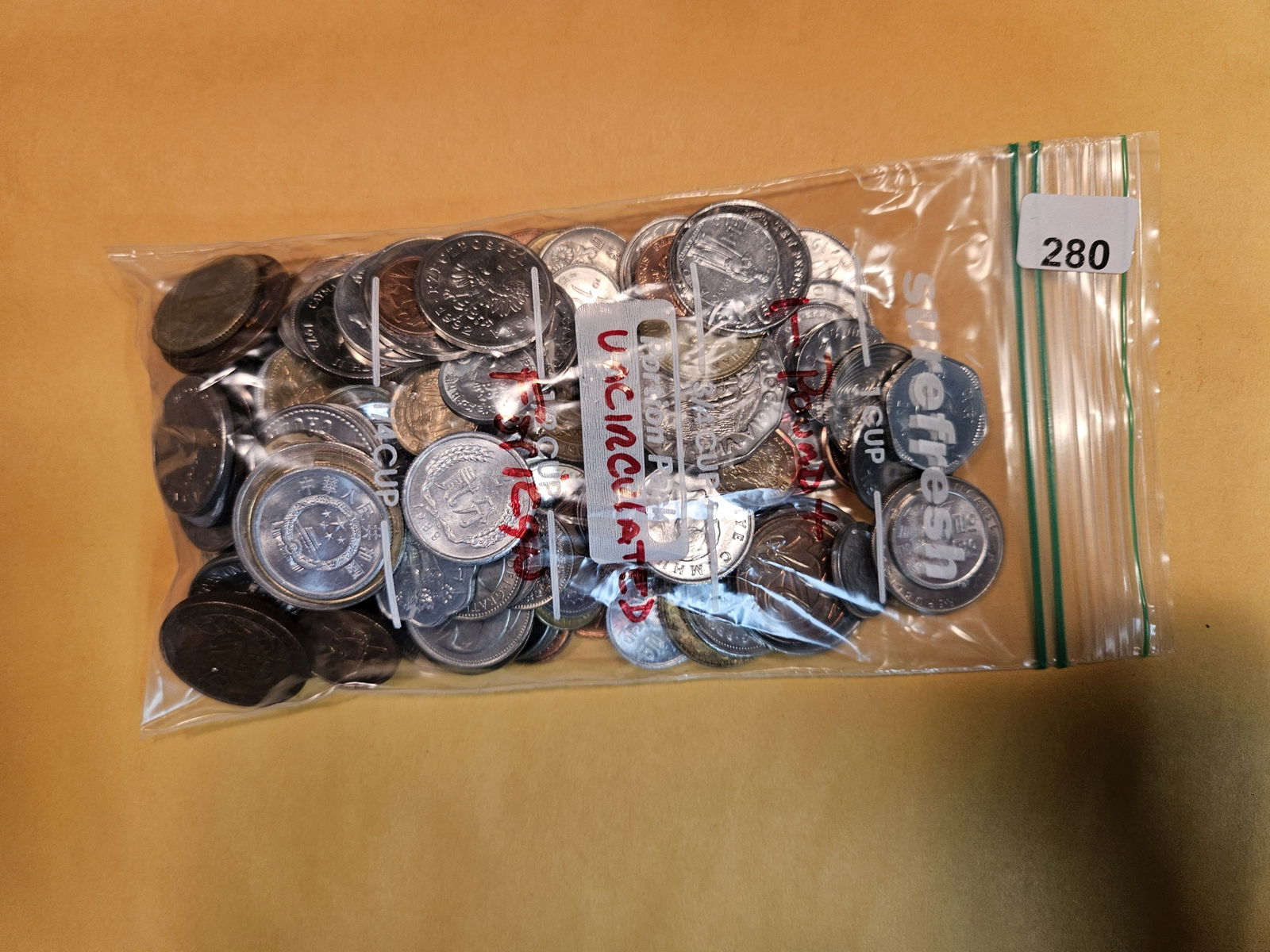 ONE POUND of Brilliant Uncirculated World coins (1 of 2)