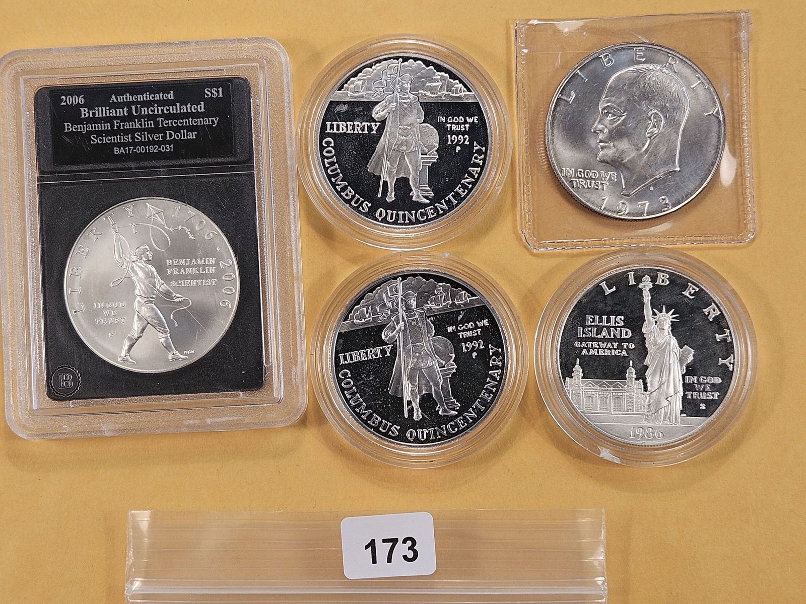 Four US Silver Commemorative Dollars and a 1973-S Silver Eisenhower (1 of 6)
