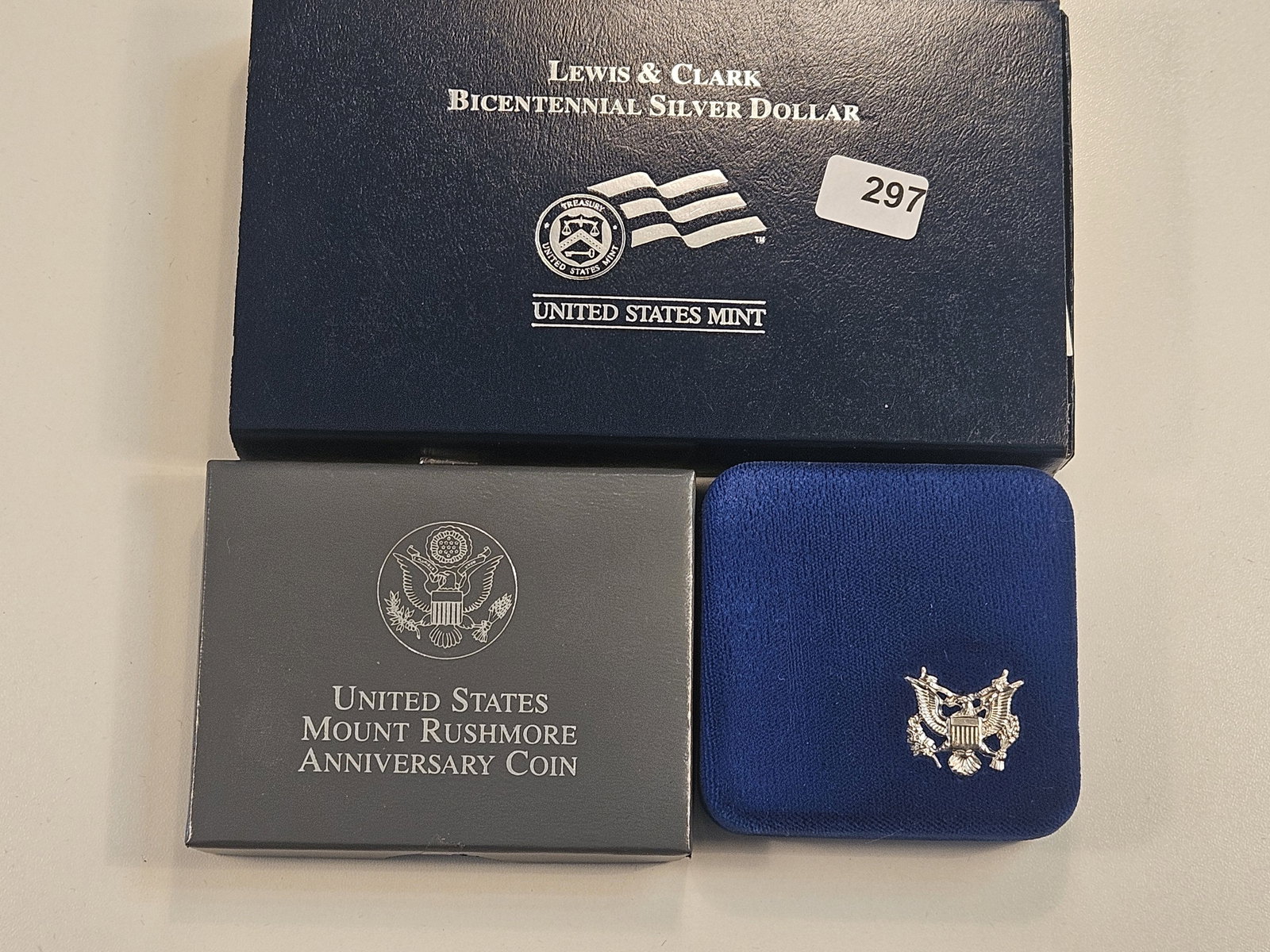 Two US Commemorative Silver Dollars and a Clad Half Dollar (1 of 2)