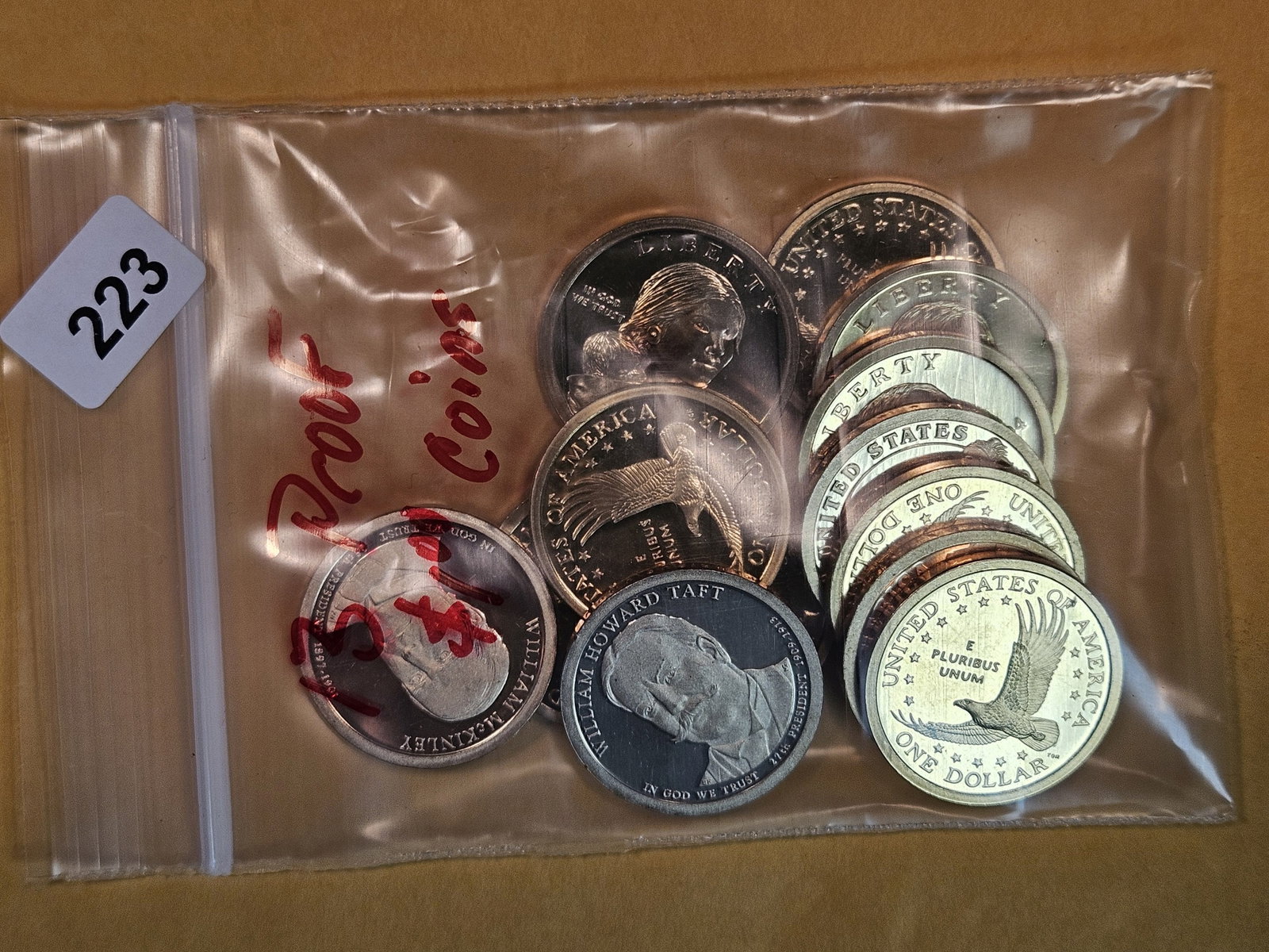 Thirteen Proof Sacagawea Dollars: From dealer. Unchecked by us