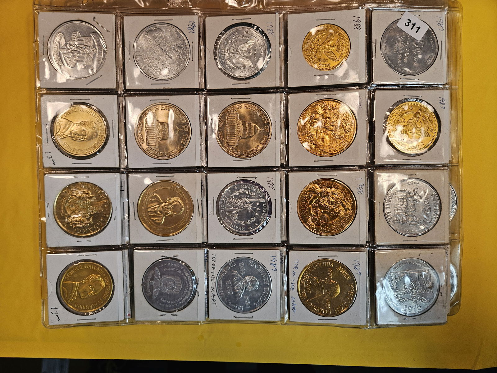 EXONUMIA!: Five nearly full sheets, over 100, mixed tokens. Most are New Orleans Mardi Gras tokens