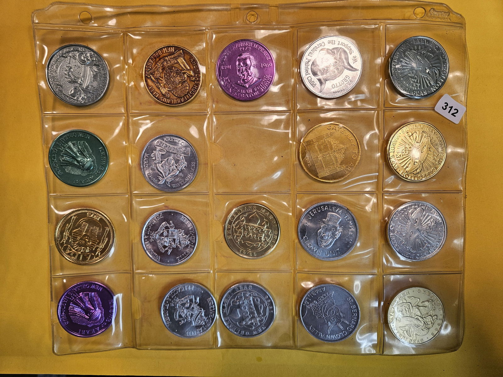 EXONUMIA!: Five nearly full sheets, over 100, mixed tokens. Most are New Orleans Mardi Gras tokens