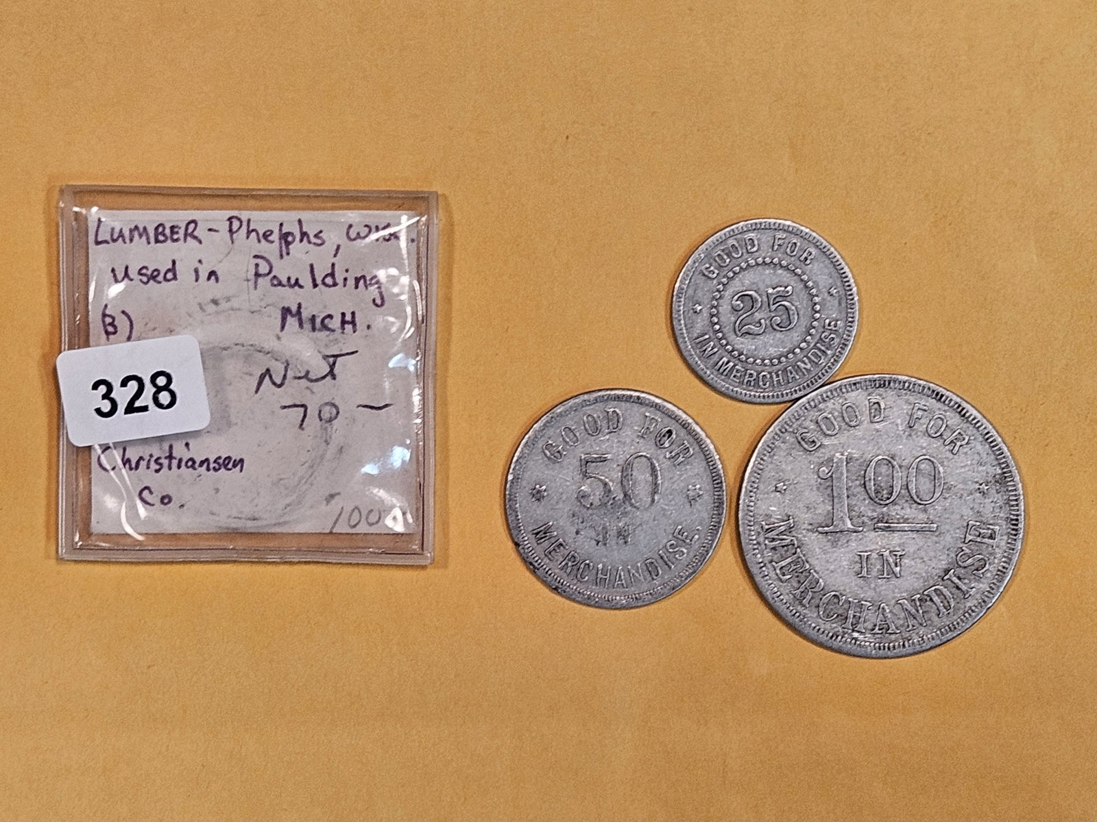 * Better group of three Good-For Tokens: Lumber. Phelps, Wisconsin. Paulding Michigan.
