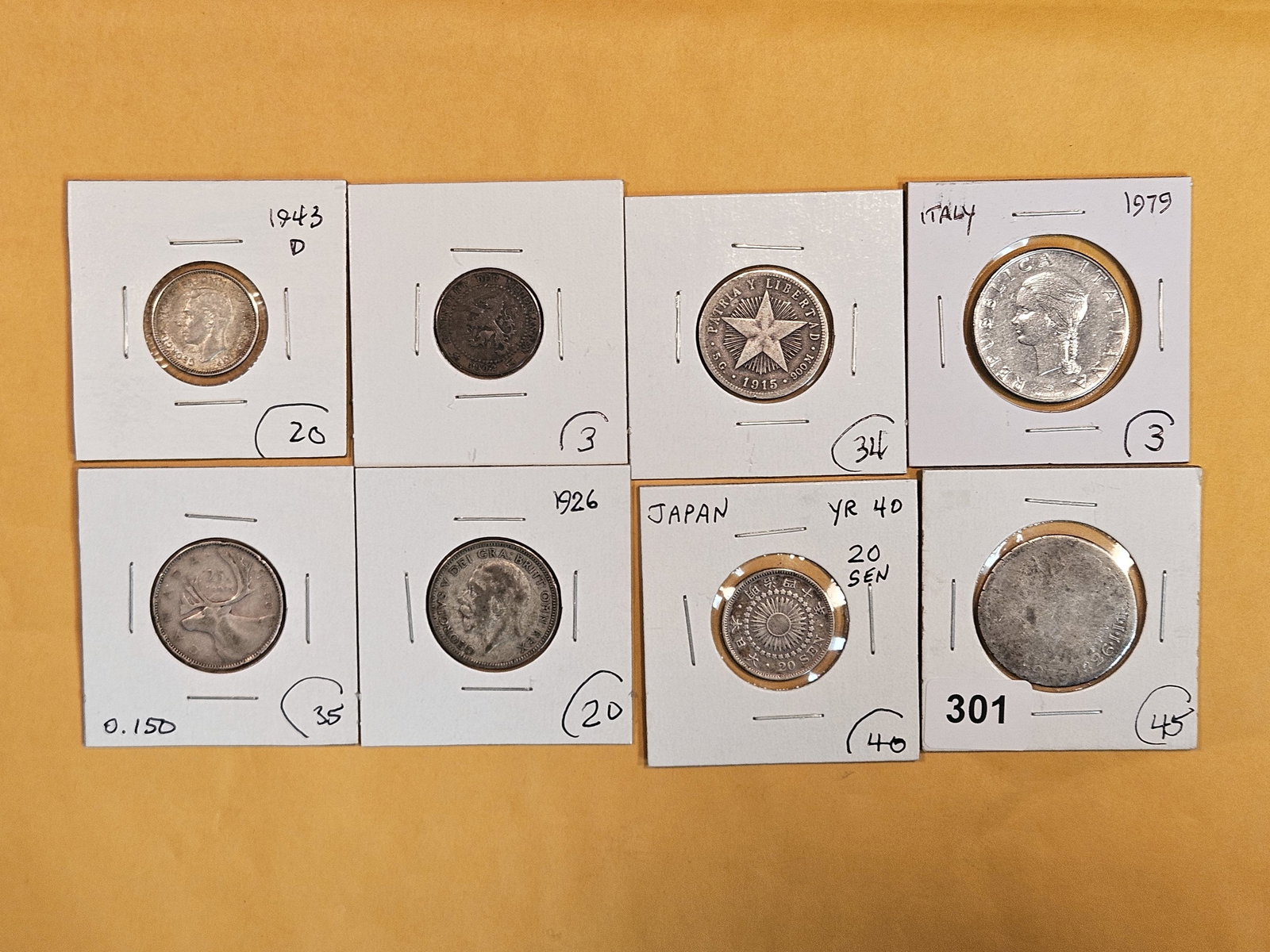 Eight mixed World coins (1 of 3)