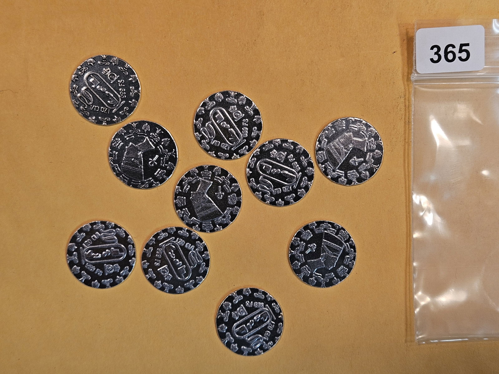 10 one-tenth troy ounce .999 fine silver art rounds: Total of one troy ounce