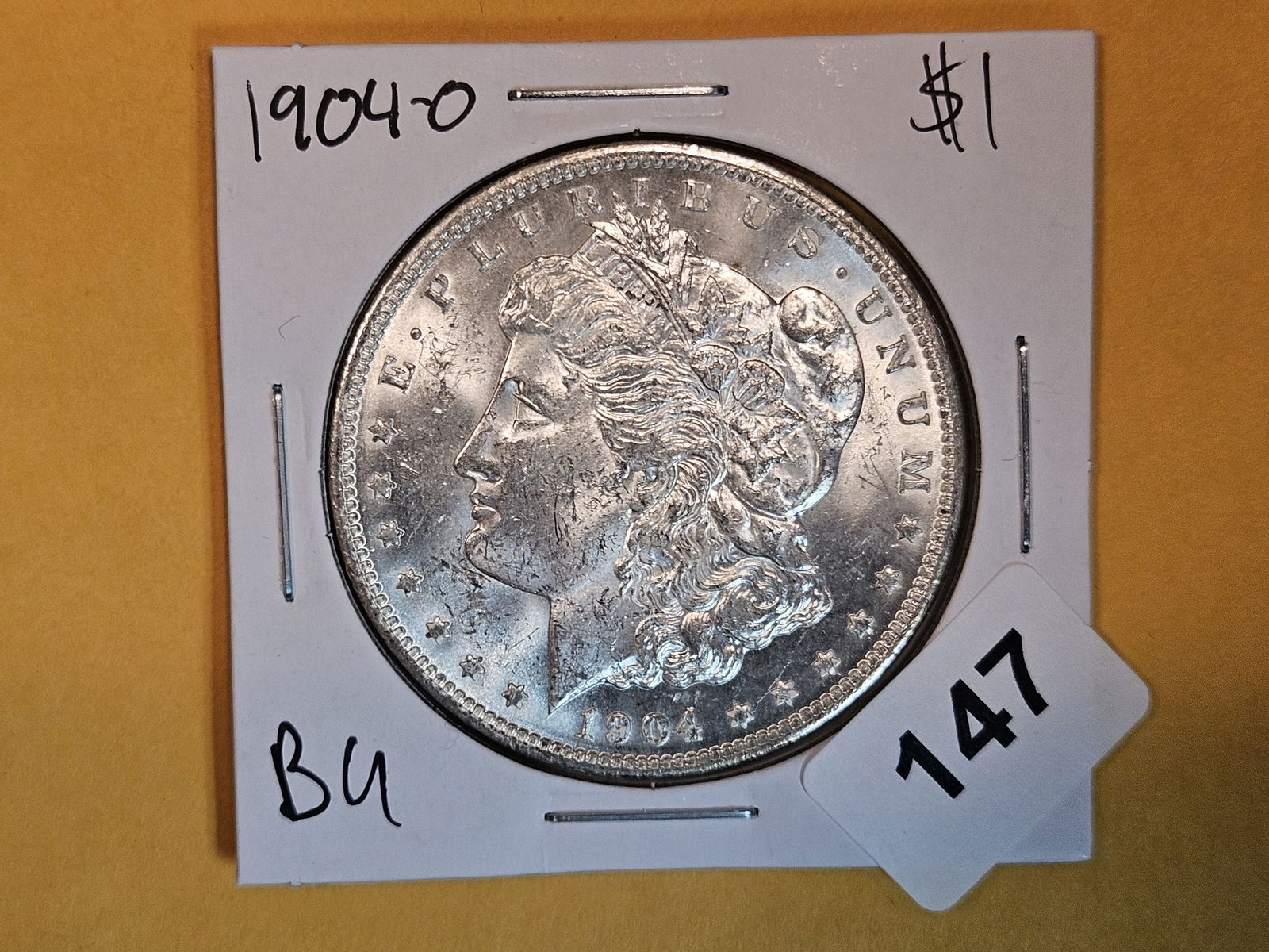 Brilliant Uncirculated plus 1904-O Morgan Dollar (1 of 3)