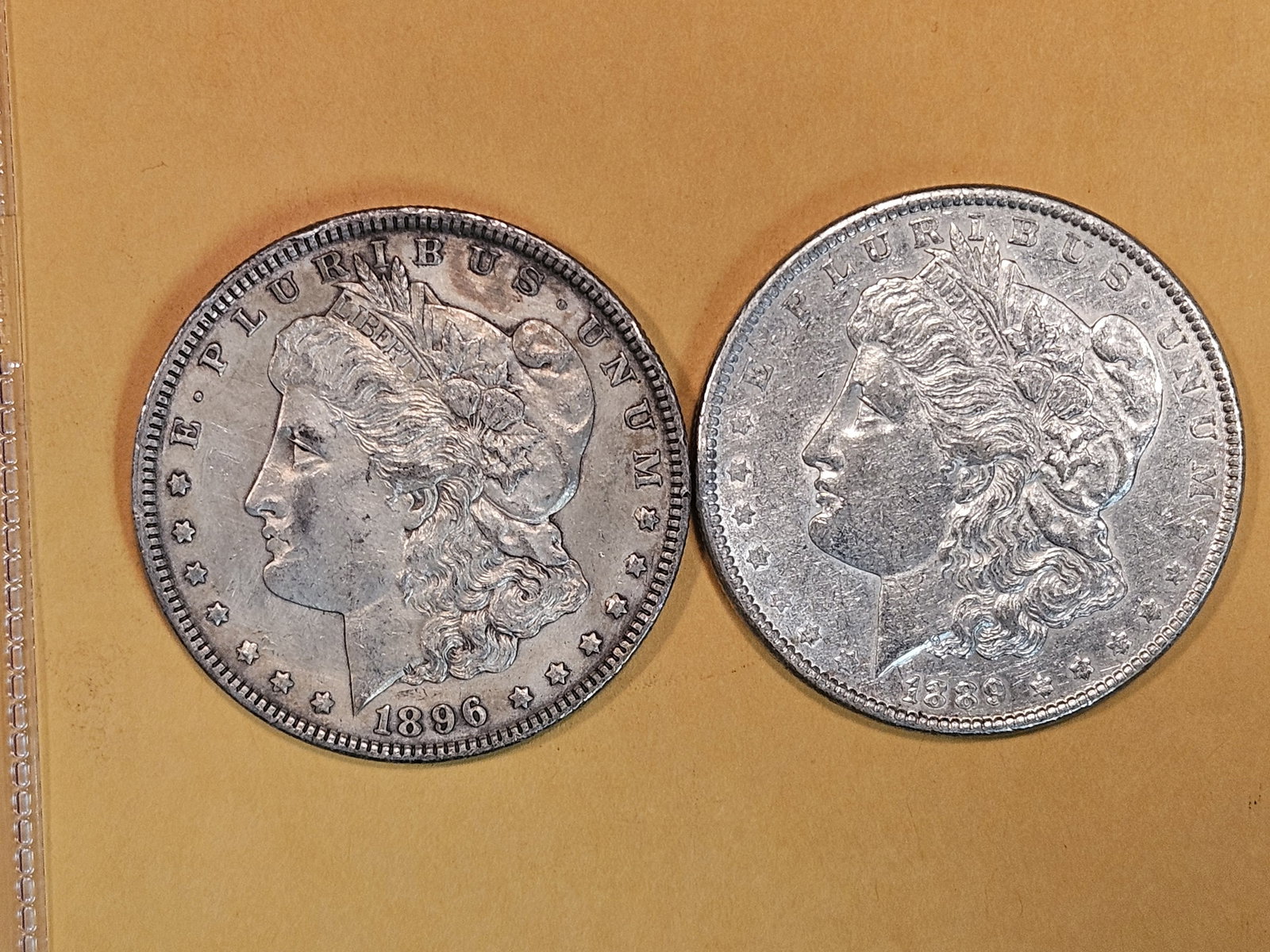Two About Uncirculated plus - details Morgan Silver Dollars (1 of 3)