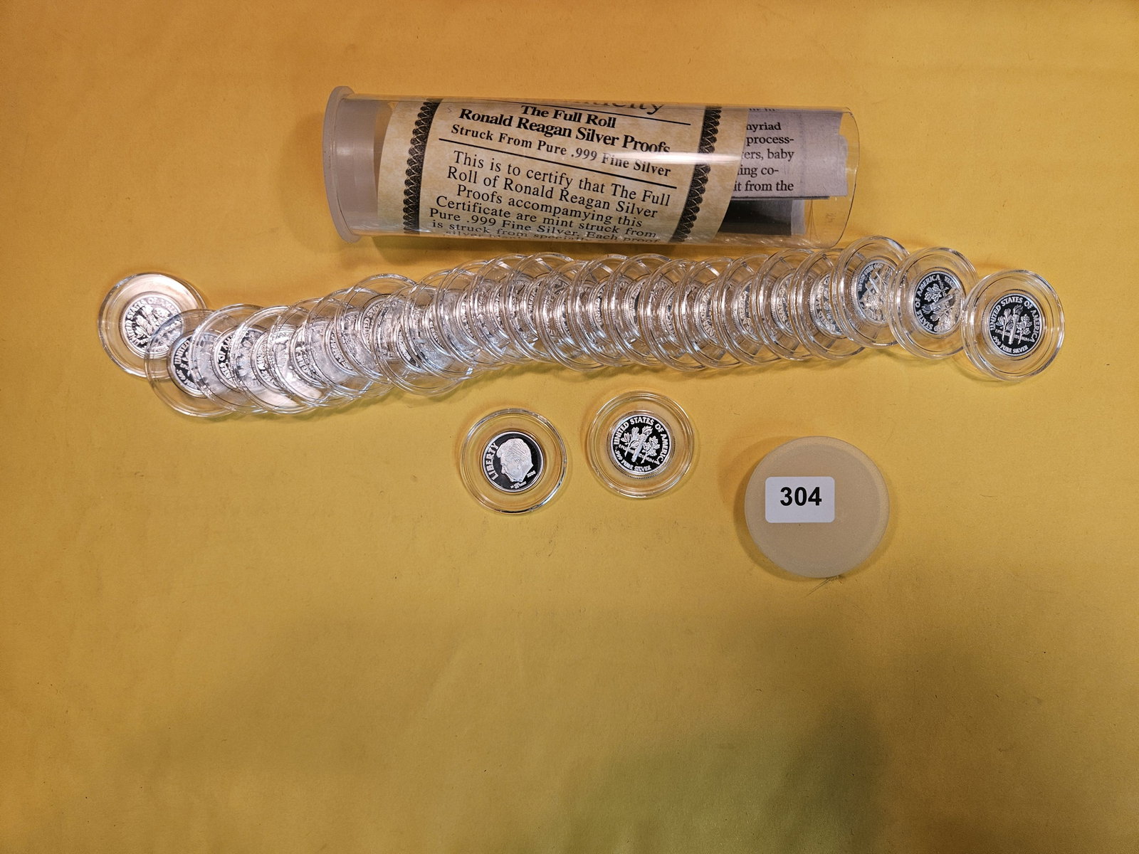 TWENTY-FIVE SILVER Proof Ronald Reagan coins: Struck in .999 fine silver. Each one the size of a dime