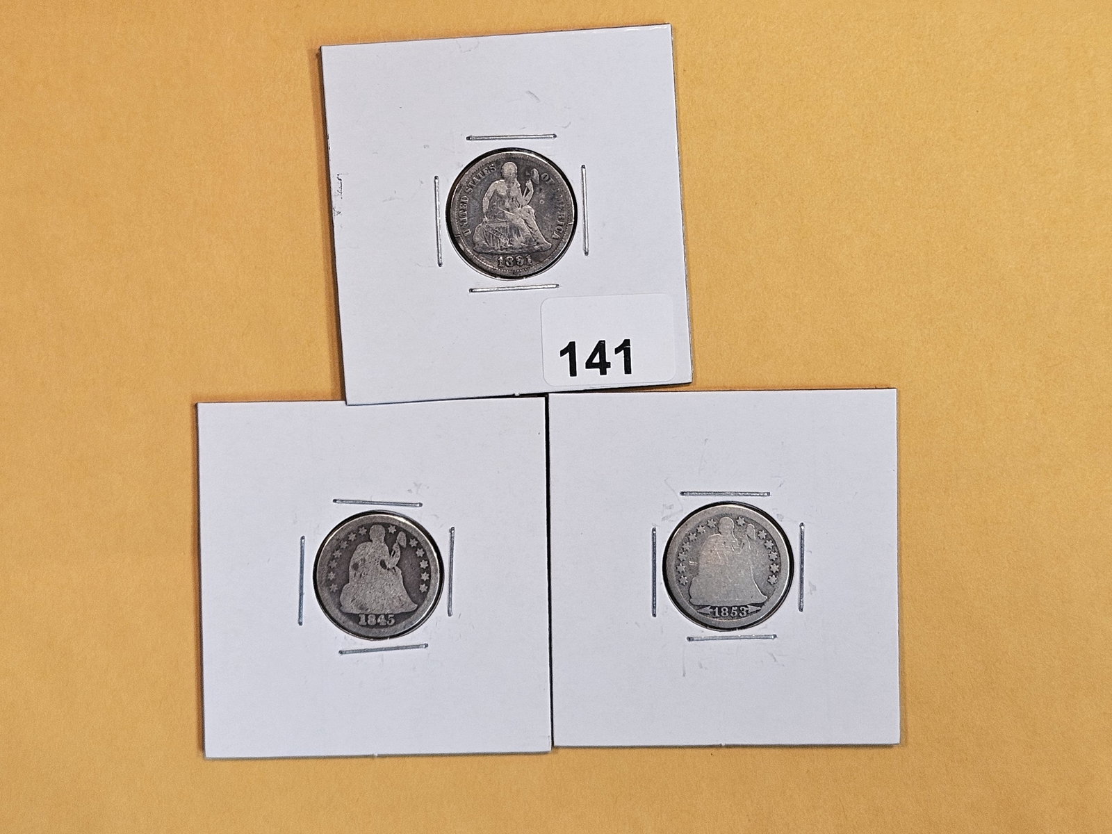 Three Seated Liberty silver dimes (1 of 4)