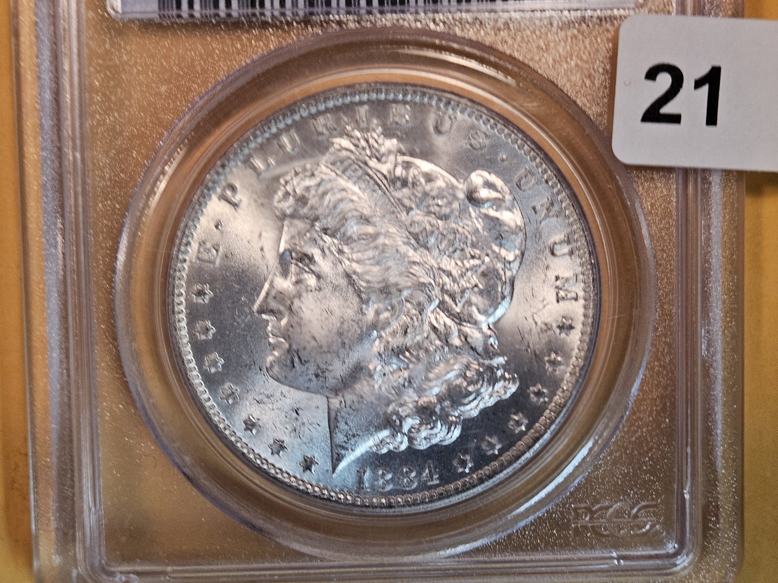 PCGS 1883-O Morgan Dollar in Mint State 63 (1 of 3)