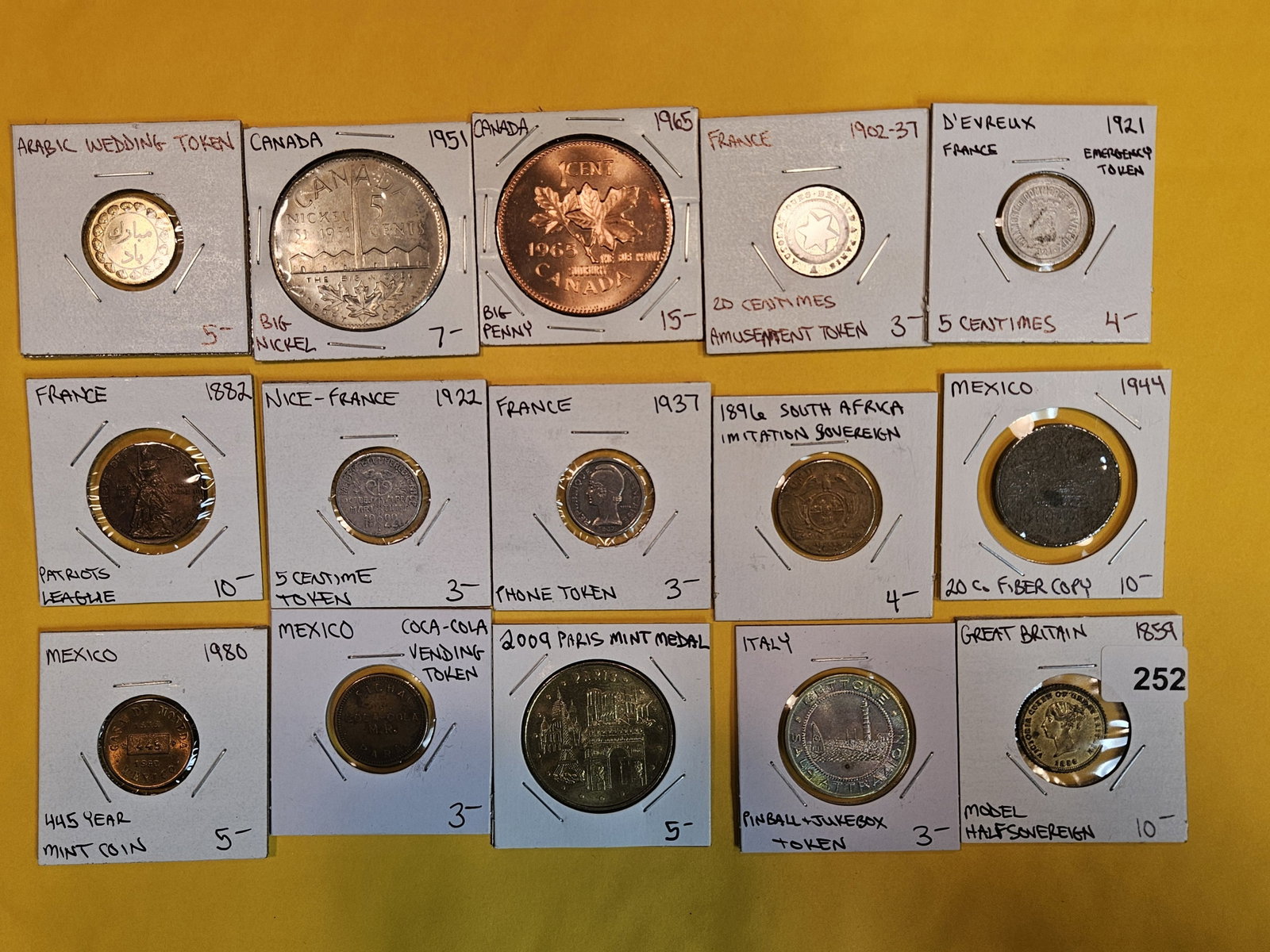 Fifteen mixed World Tokens: From all over the globe!