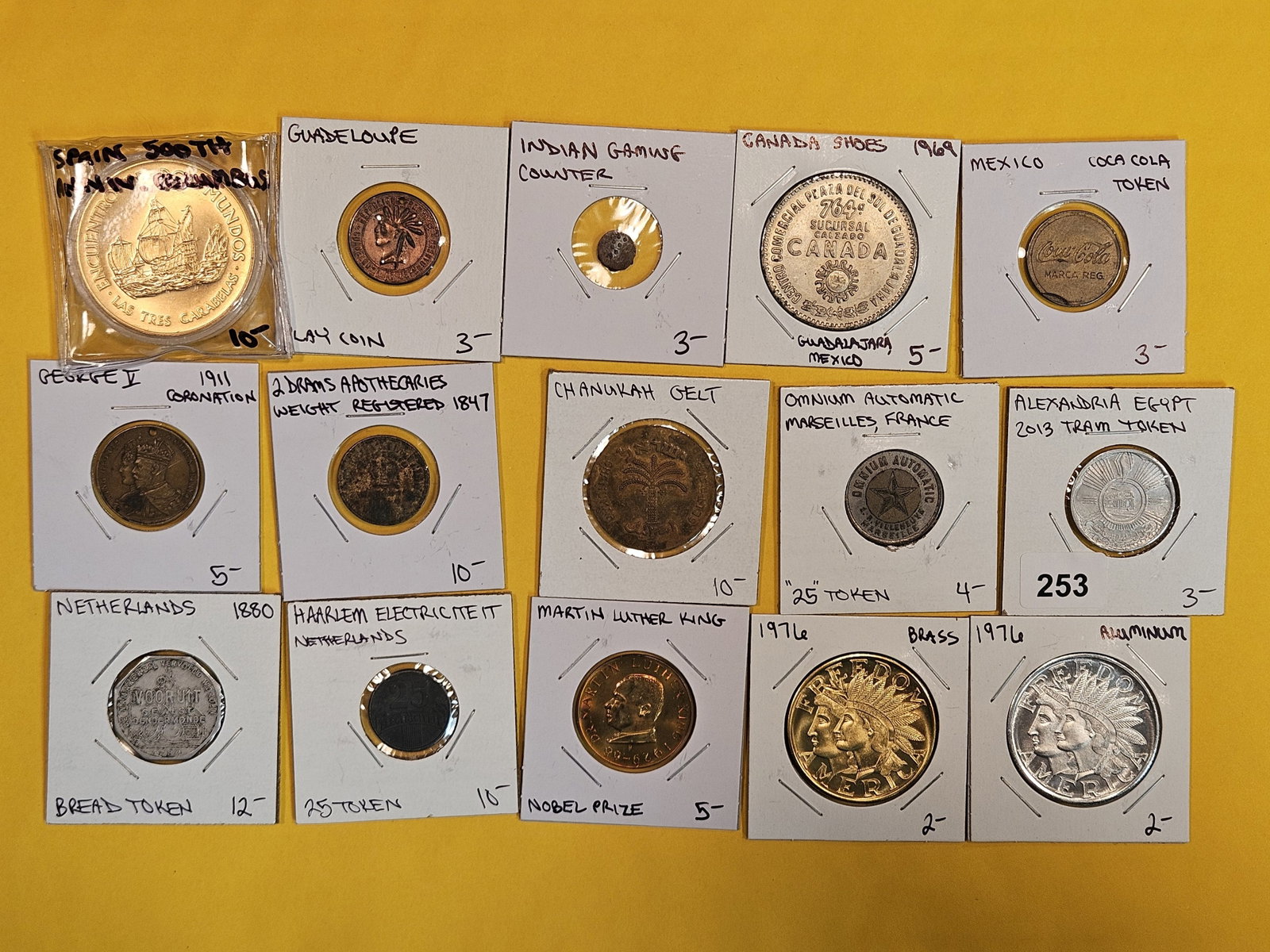 Fifteen mixed World Tokens: From all over the globe!