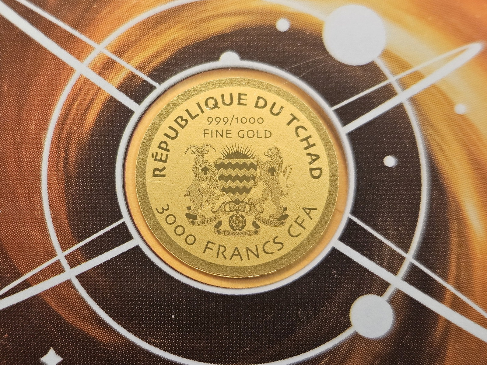GOLD! Republic of Chad Gold 3000 Francs: 1/1000 of an ounce of .999 Fine Gold. Cool black hole design