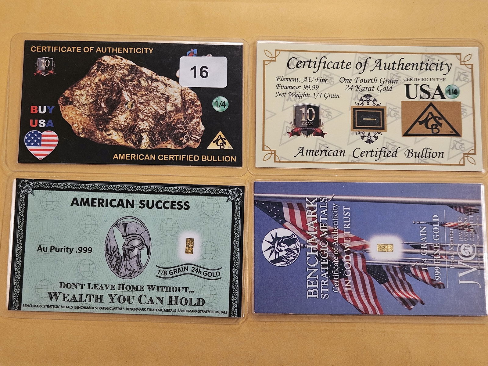 GOLD! Four Assay Card .999 Fine Gold Mini Bars: Two Benchmark Strategic Metals and two American Certified Bullion cards