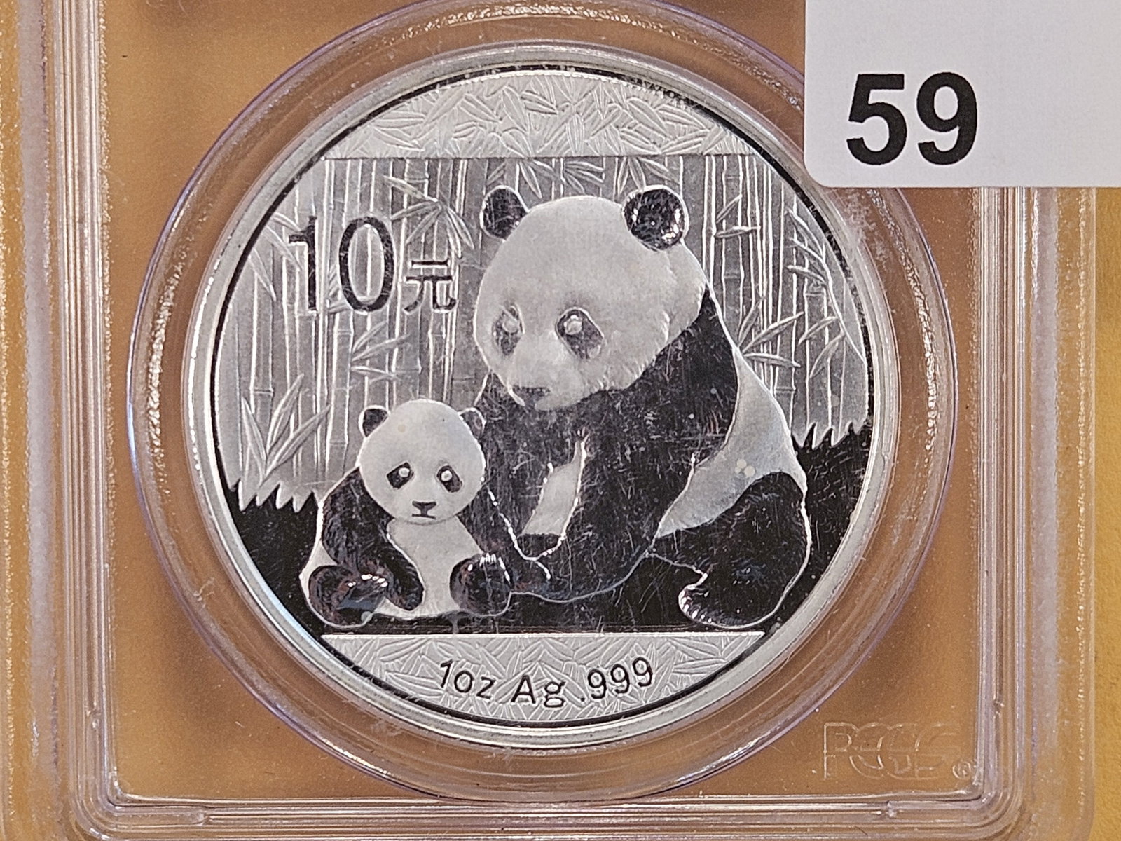 PCGS 2012 China Silver Ten Yuan in GEM Brilliant Uncirculated: Panda, in First Strike holder