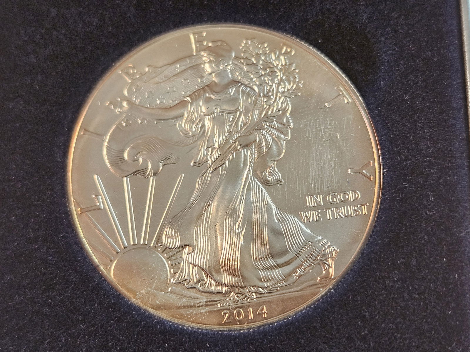 And last but not least, a GEM BU 2014 American Silver Eagle (1 of 4)